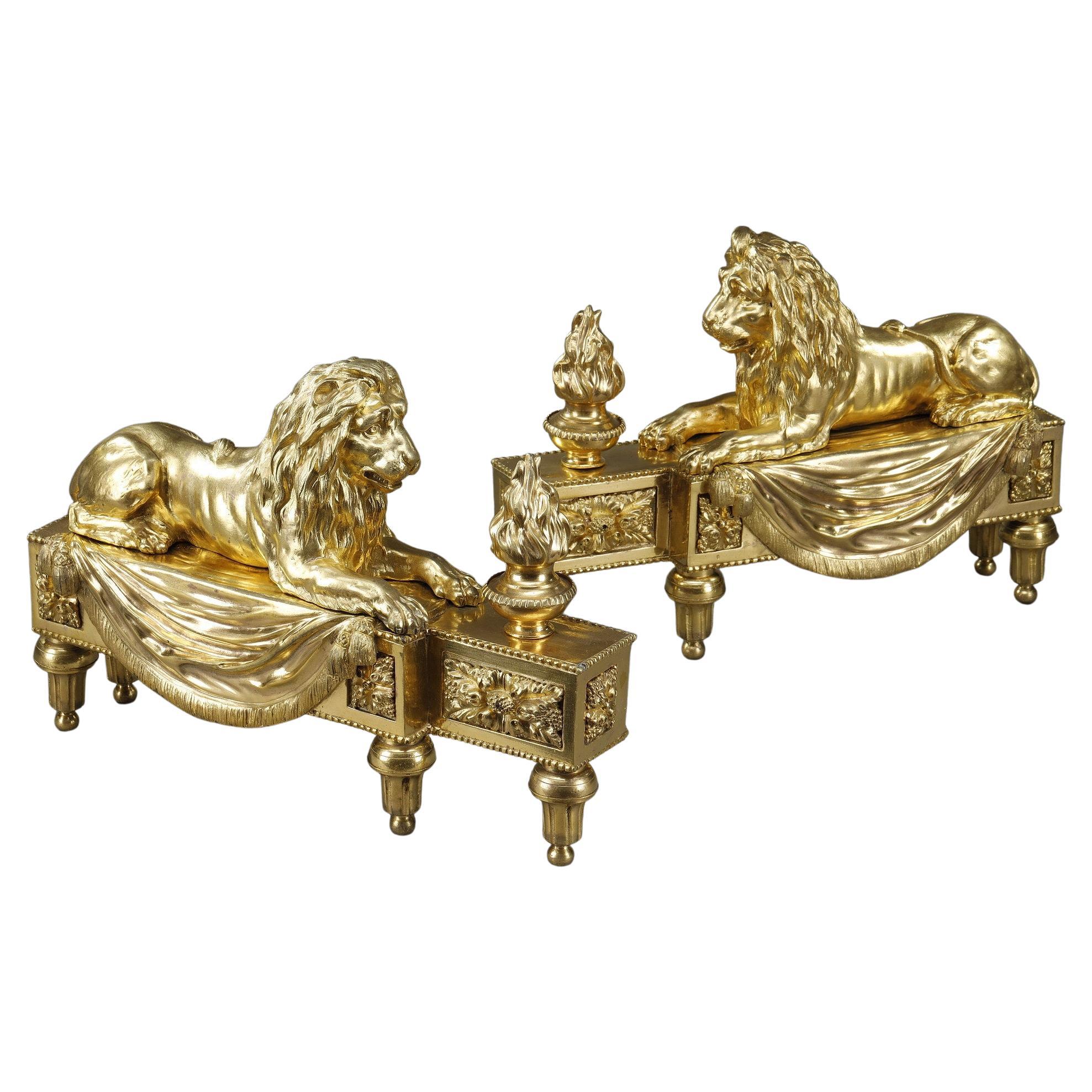 Pair of Andirons with Lions in Gilded and Chiseled Bronze For Sale