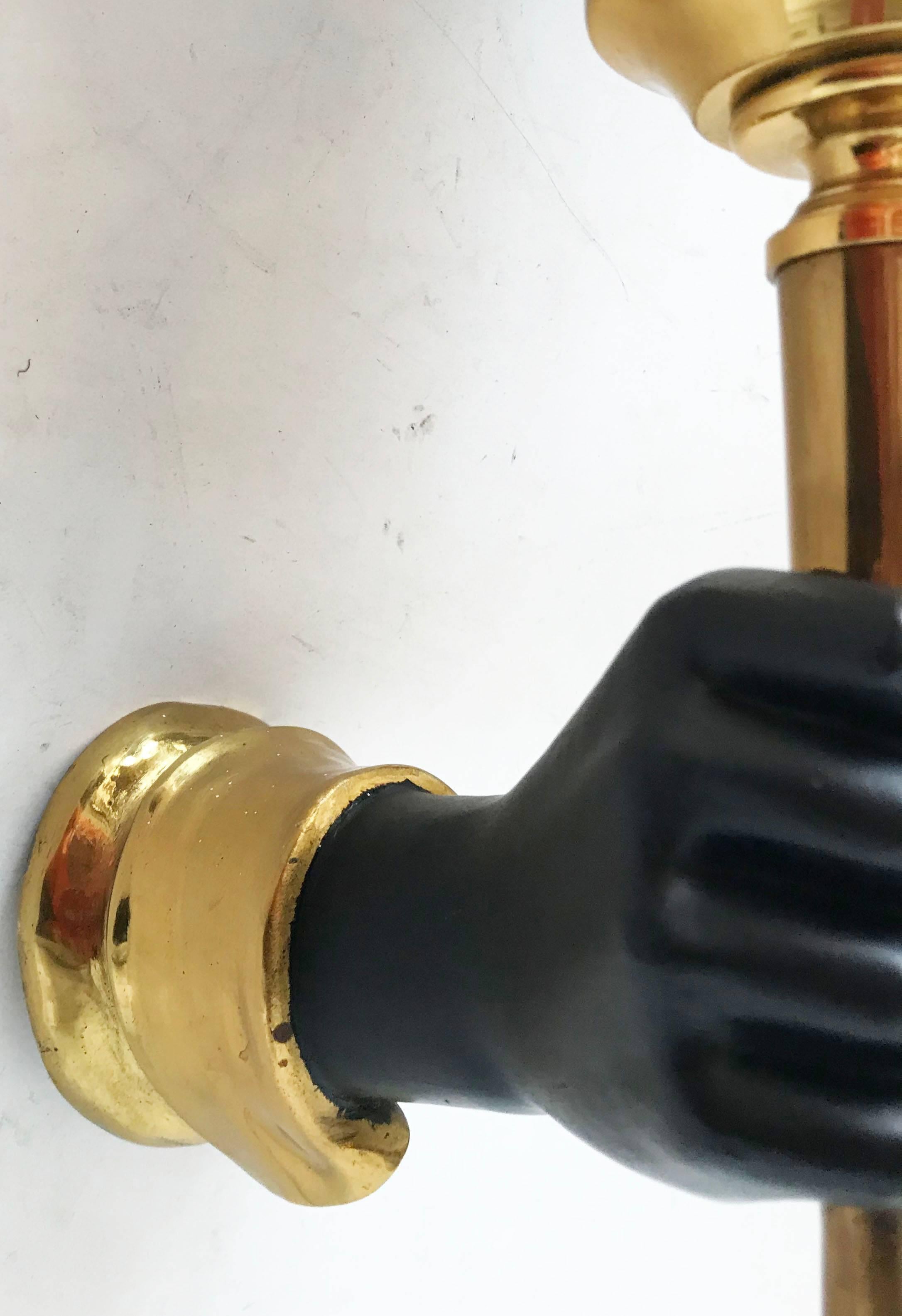 Superb pair of Andre Arbus style sconces in bronze, very heavy and well done.
60 watts max bulb.
US rewired and in working condition 
Backplate: 3 inches diameter.
Have a look on our impressive collection of French and Italian Mid Century Period