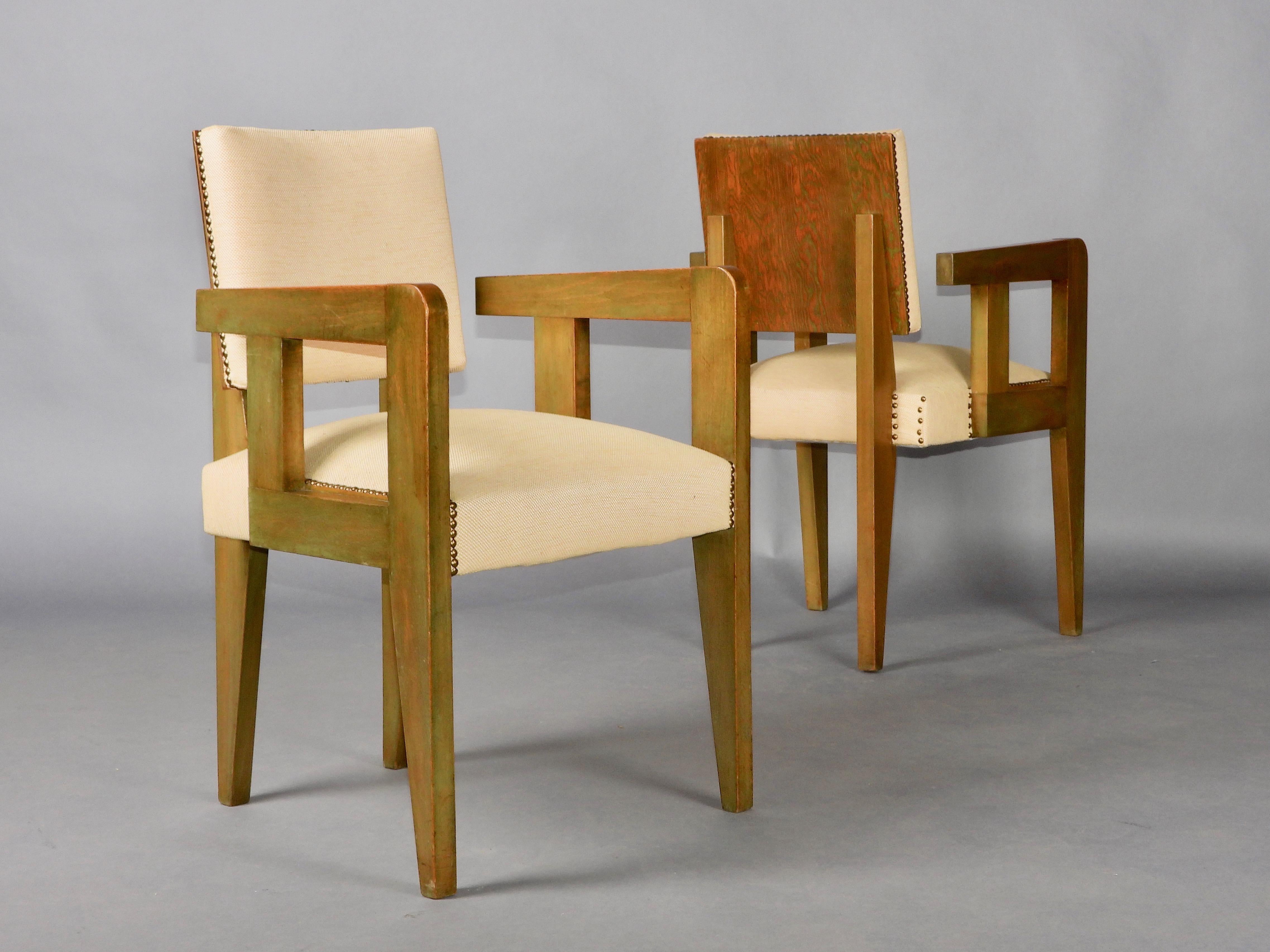 Pair of bridge chairs stained Oregon pine on the back side , lacquer olive green color wood, brass nail-heads and fabric upholstery, each underside stamped 'BREVETE SORNAY/FRANCE ETRANGER