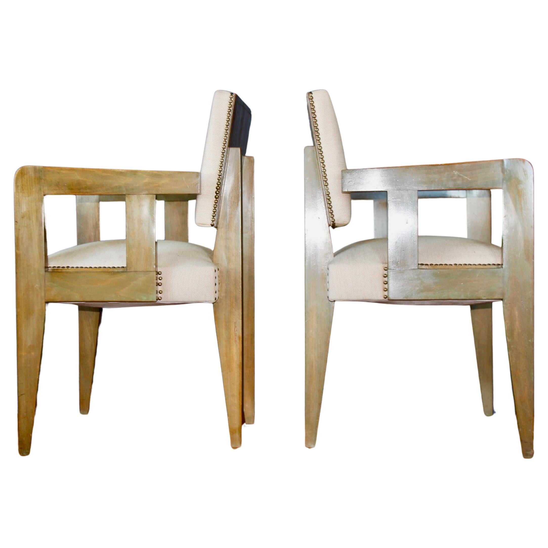 Pair of Andre Sornay bridge chairs, stained Oregon pine, ebonised wood