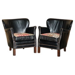 COPPIA DI POLTRONE REVERSIBILI “LITTLE PROFESSOR” IN PELLE NERA CON MOTIVO KILIM DI ANDREW MARTIN
