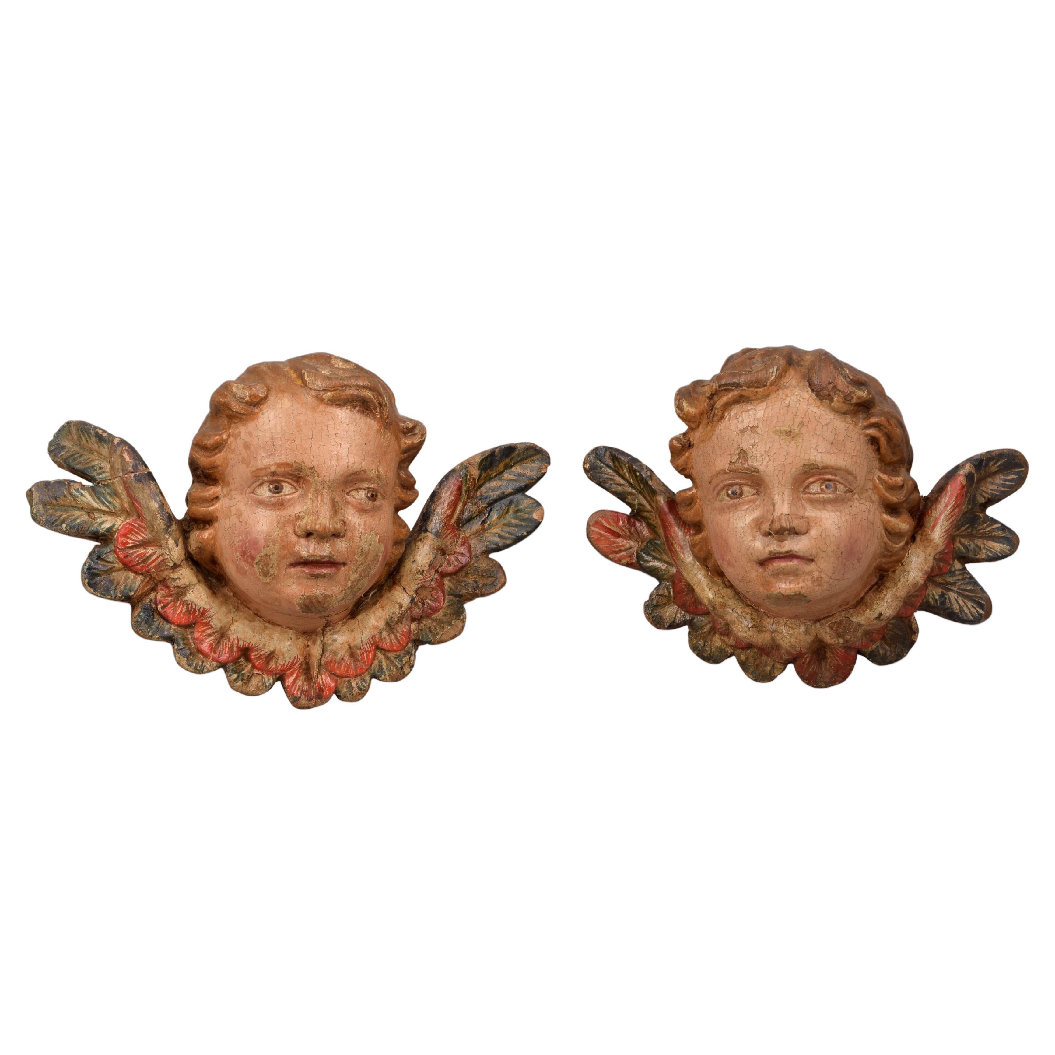 Pair of Angel Heads, Carved and Polychrome Wood, Spanish School, 18th Century