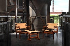 Pair of Angel Pazmiño Sling Armchairs and one Ottoman