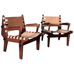 Pair of Angel Pazmiño Sling Armchairs and one Ottoman