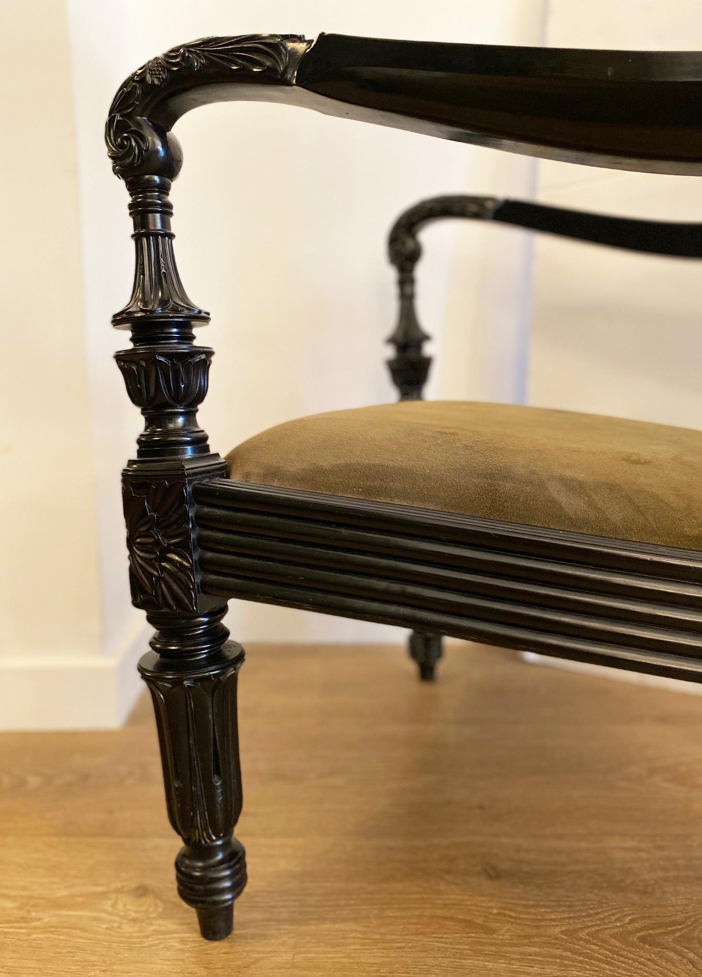 Hand-Carved Pair of Anglo-Indian Carved Ebony and Caned Armchairs For Sale