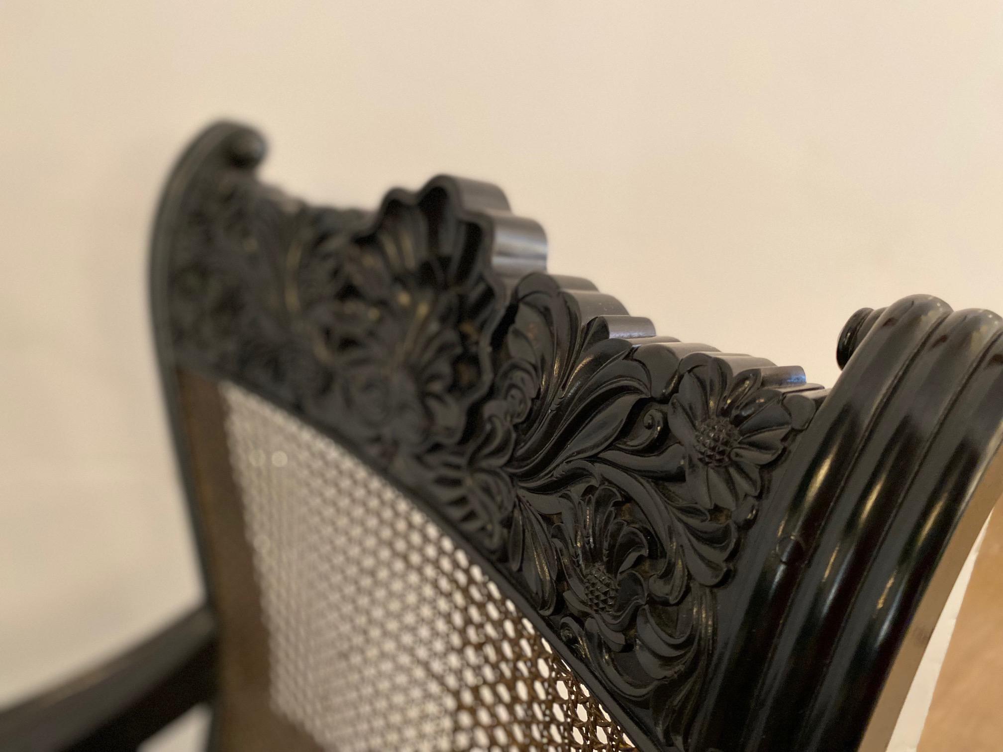 Suede Pair of Anglo-Indian Carved Ebony and Caned Armchairs For Sale