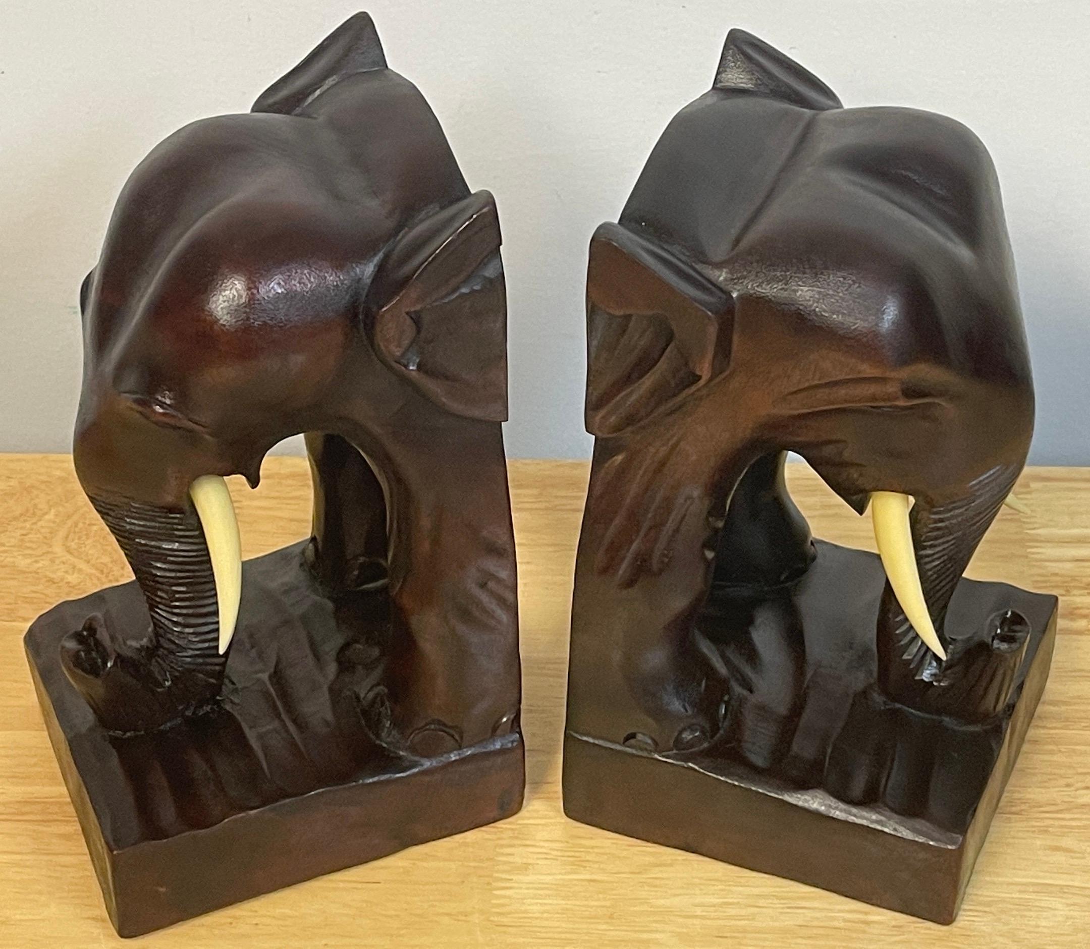 Pair of Anglo-Indian Carved Teak Elephant Bookends In Good Condition For Sale In West Palm Beach, FL