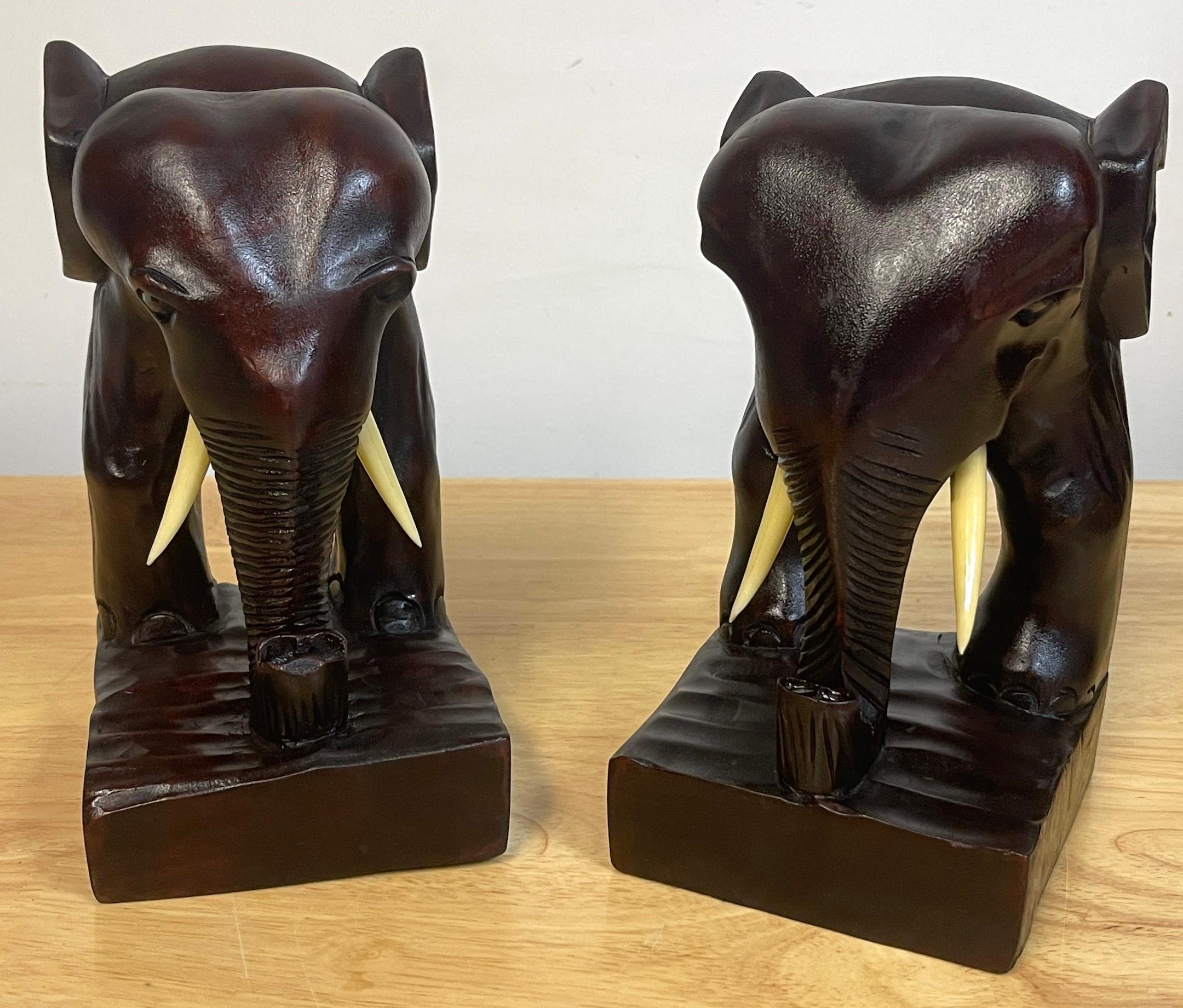 20th Century Pair of Anglo-Indian Carved Teak Elephant Bookends For Sale