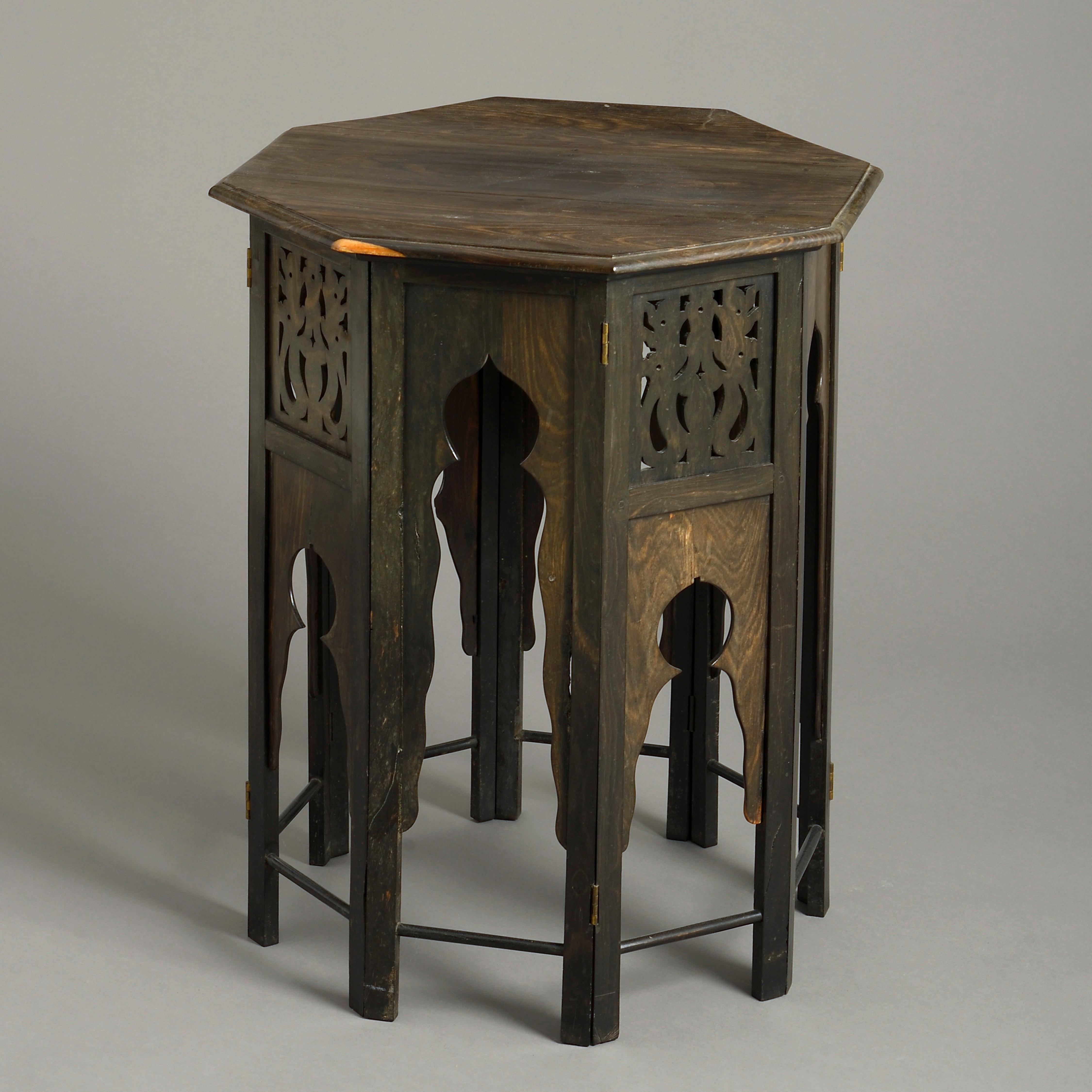 A fine pair of Anglo-Indian octagonal ebony lamp tables, circa 1900.
