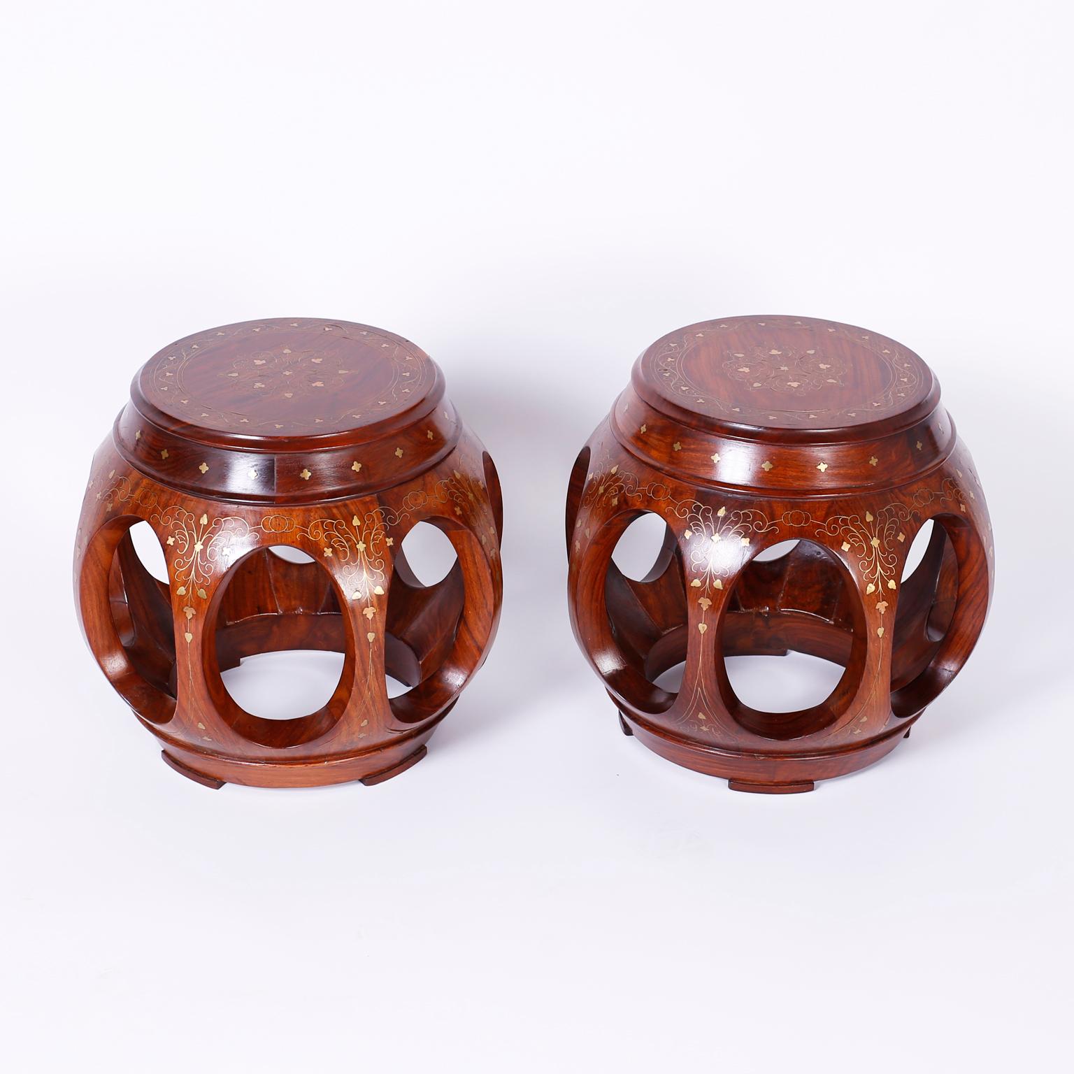 Antique pair of Anglo-Indian stands or seats crafted in indigenous rosewood with a Classic form and featuring delicate brass string inlays in exotic floral designs on the tops and bases.