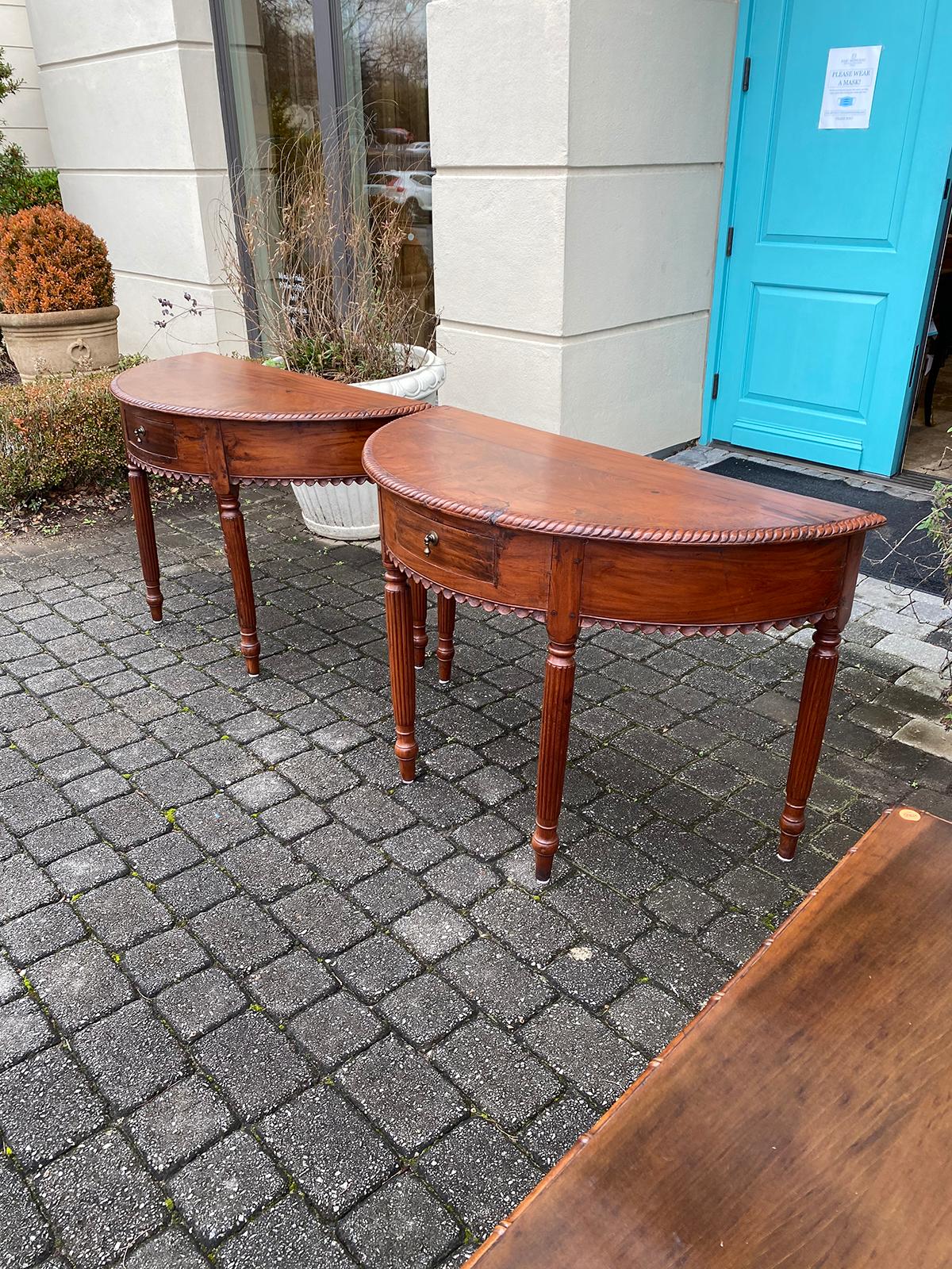 Pair of Anglo-Indian or Anglo-Caribbean Carved Demilune Console Tables In Good Condition In Atlanta, GA