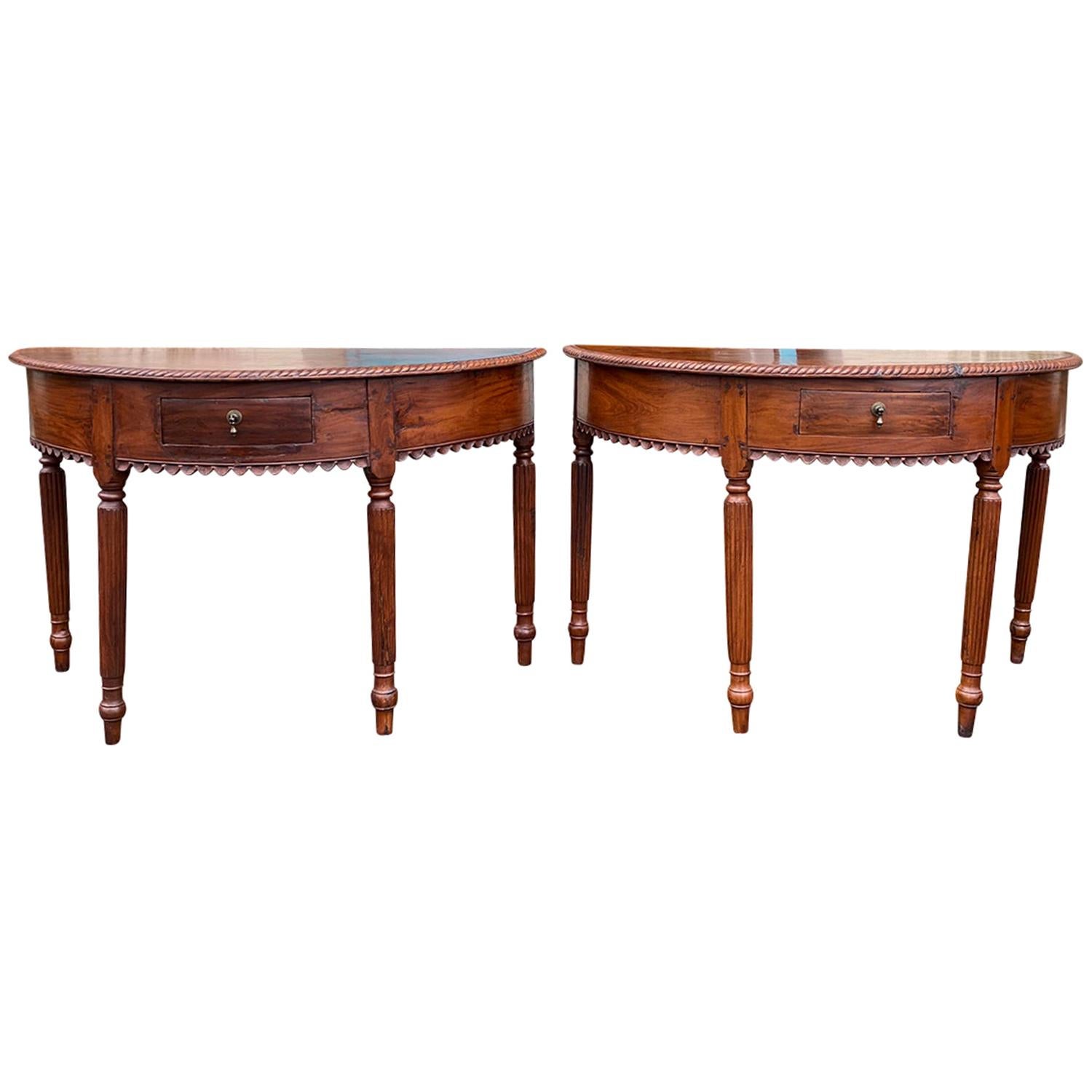 Pair of Anglo-Indian or Anglo-Caribbean Carved Demilune Console Tables