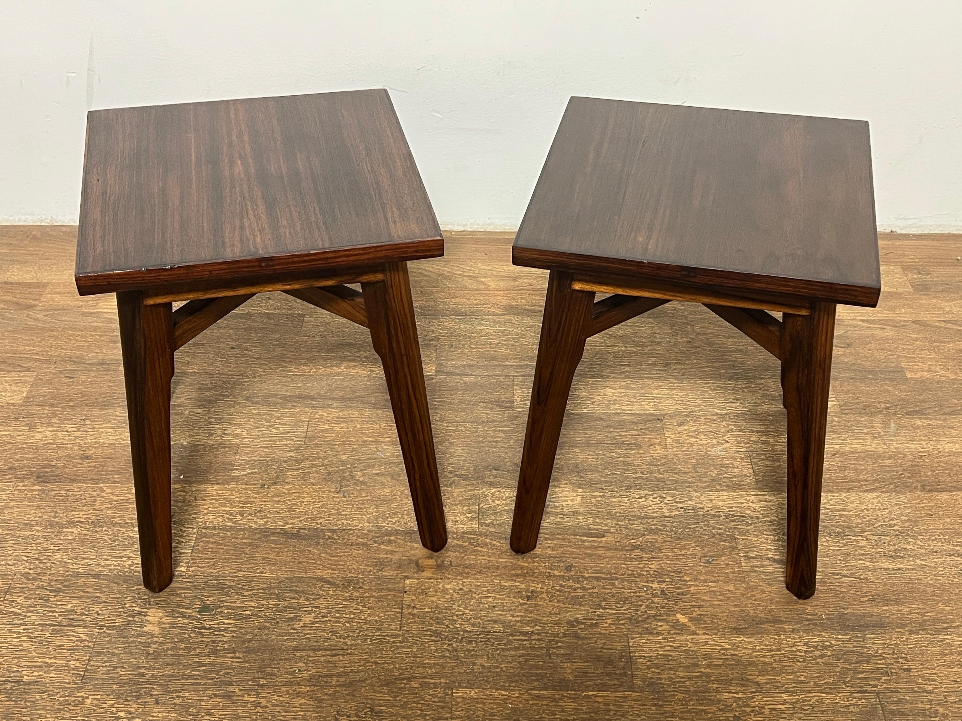 A pair of Anglo Indian rosewood side tables or stools made in Madras by the venerable old British purveyor Spencer & Co. Ltd., circa 1950s.