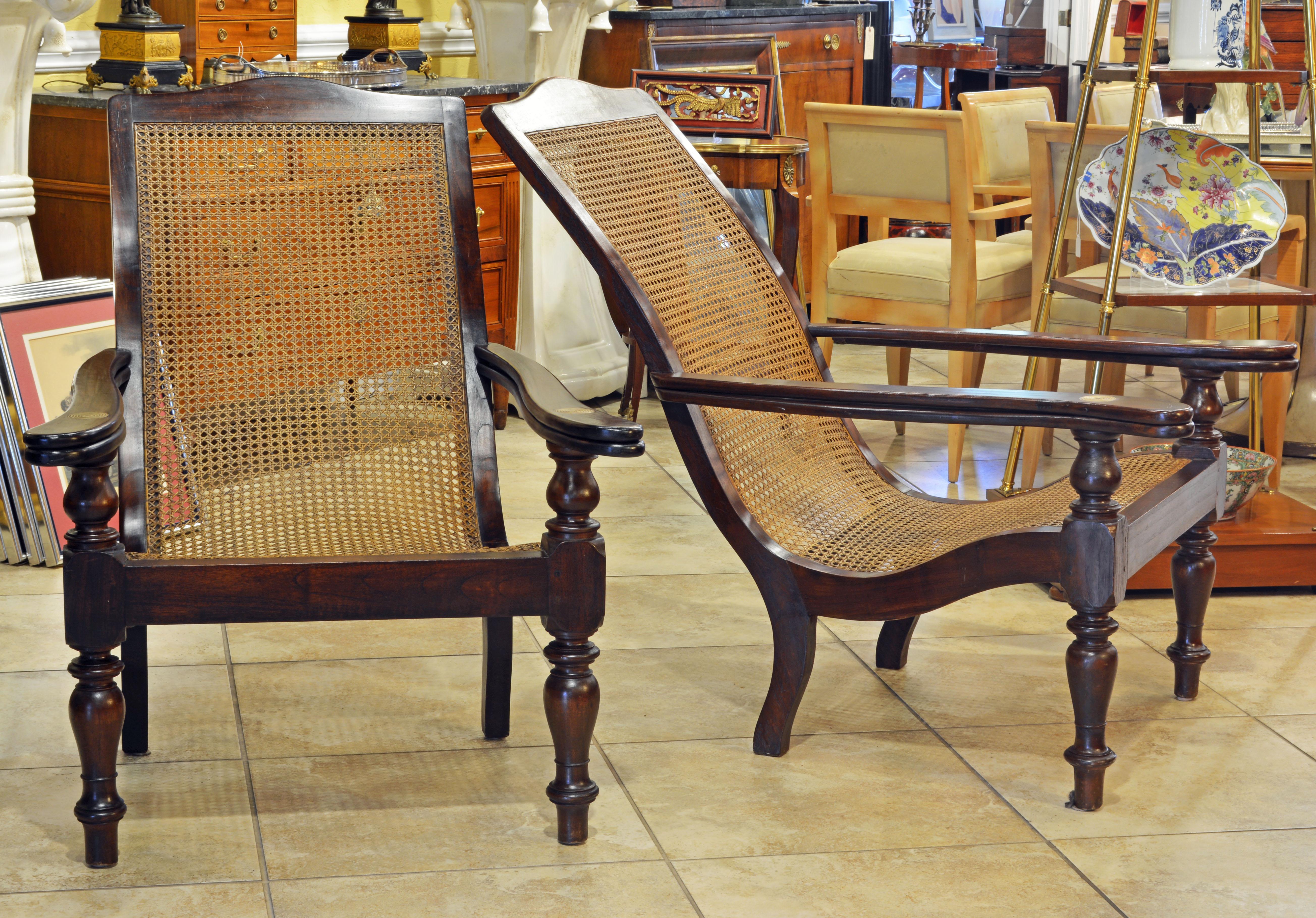British Colonial Pair of Anglo Indian Style 20th Century Mahogany and Cane Seat Plantation Chairs