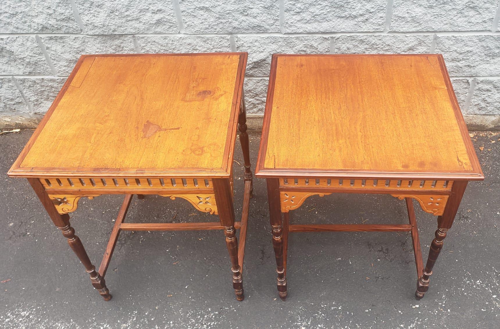 An exquisite pair of Anglo-Indian Victorian style walnut and rosewood square side tables. Measure 21.25
