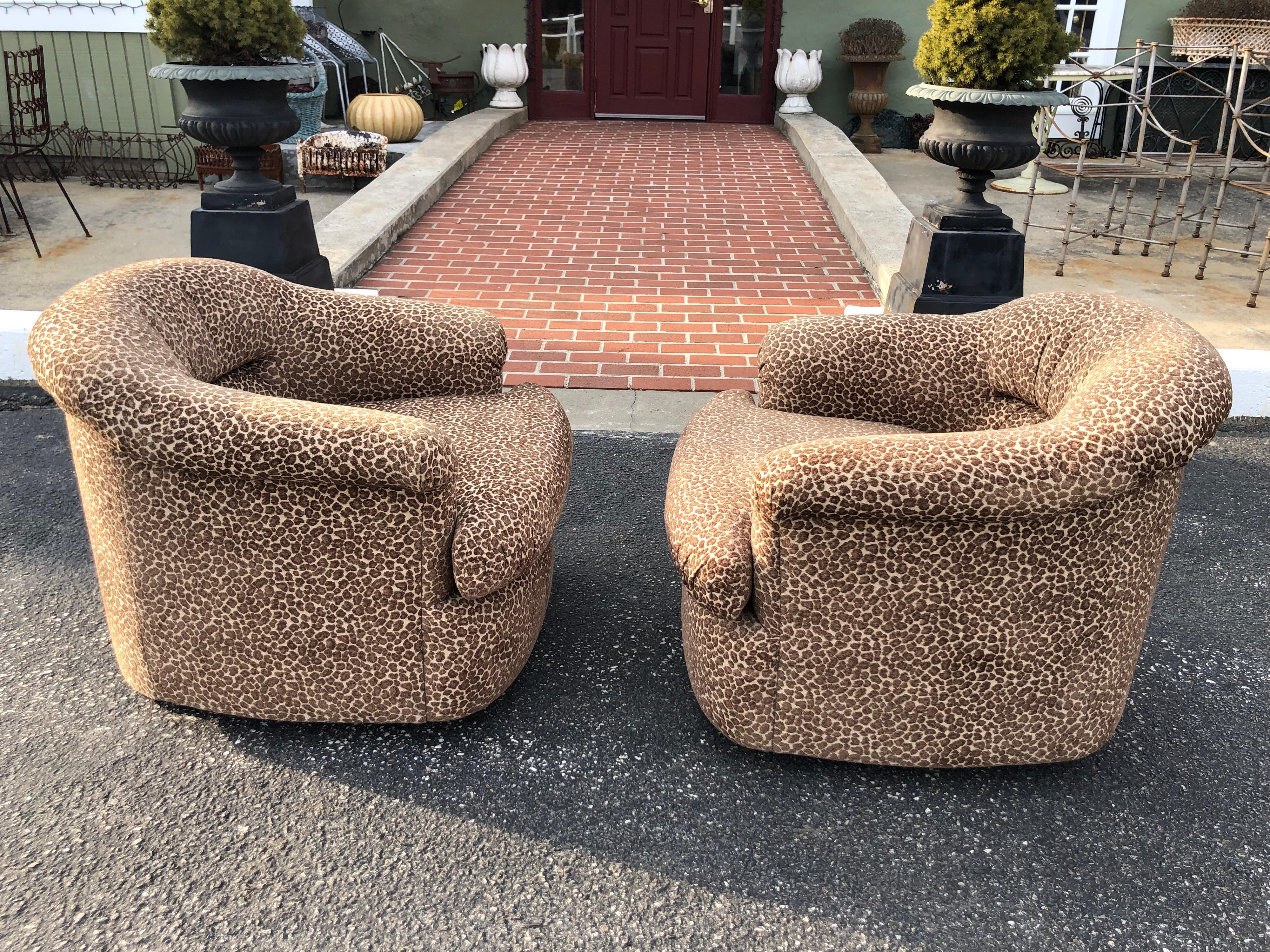 Late 20th Century Pair of Mid Century Animal Print Club Chairs on Casters