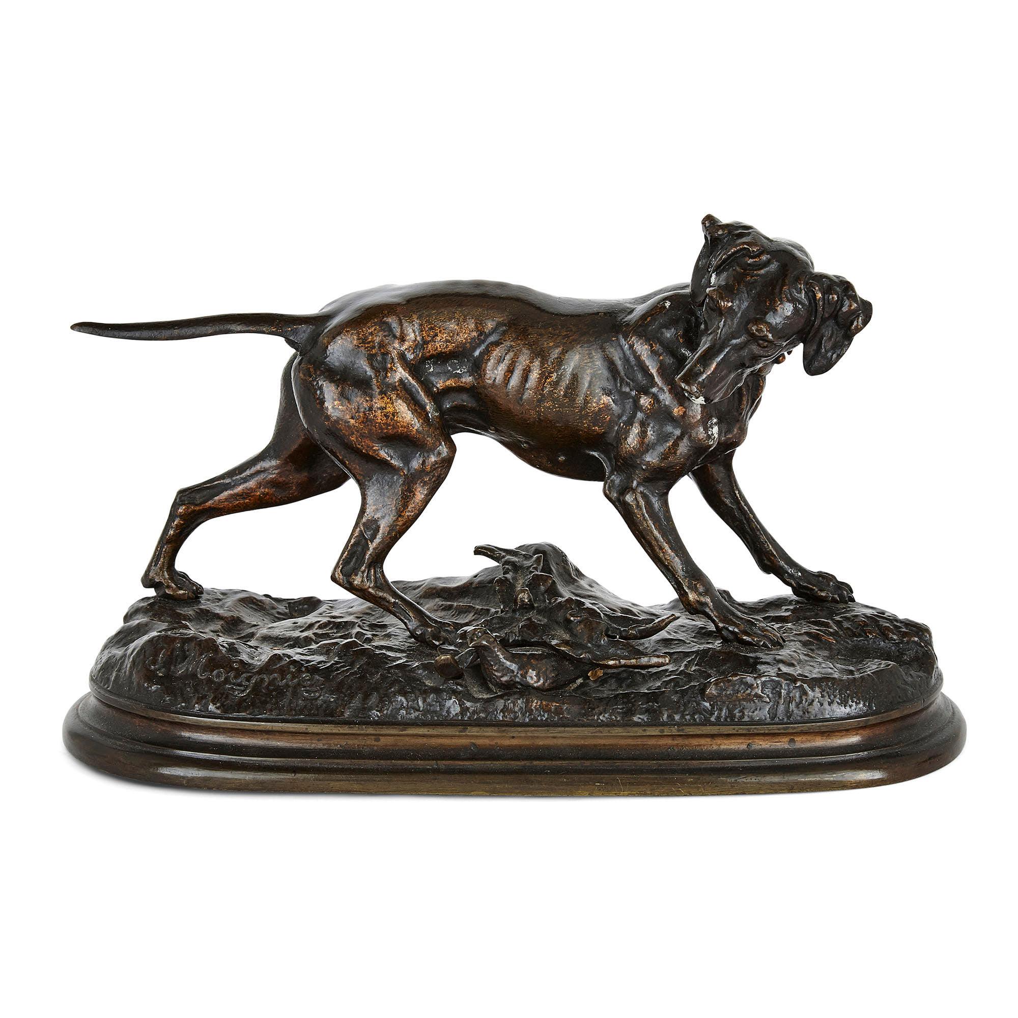 Pair of animalier bronze dog sculptures by Jules Moigniez
French, late 19th Century
Measures:Height 13cm, width 22cm, depth 10cm

This charming pair of dog sculptures is by the French animalier sculptor Jules Moigniez, who has been celebrated