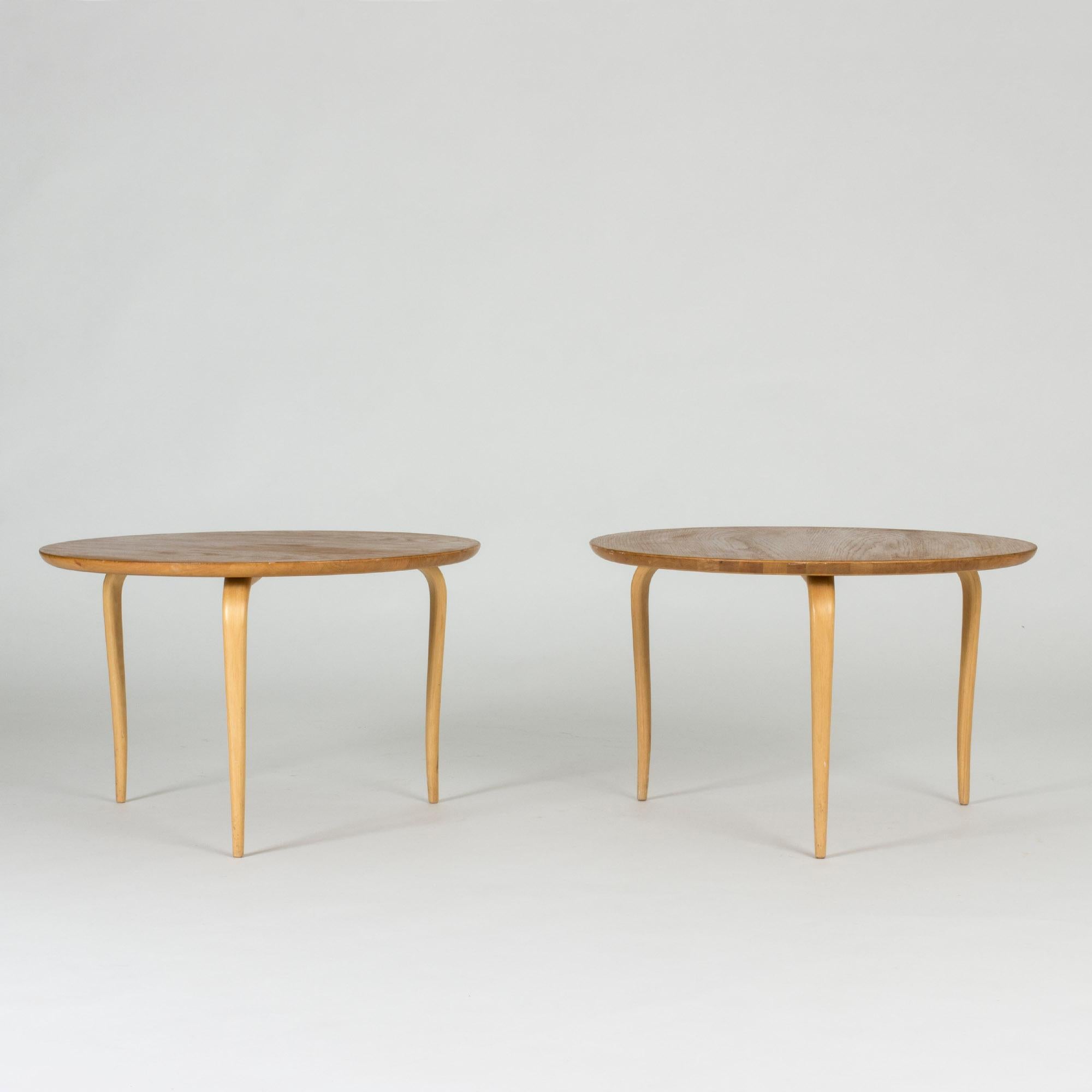 Pair of beautiful “Annika” side tables by Bruno Mathsson. Round oak table tops, slender legs made from beech.