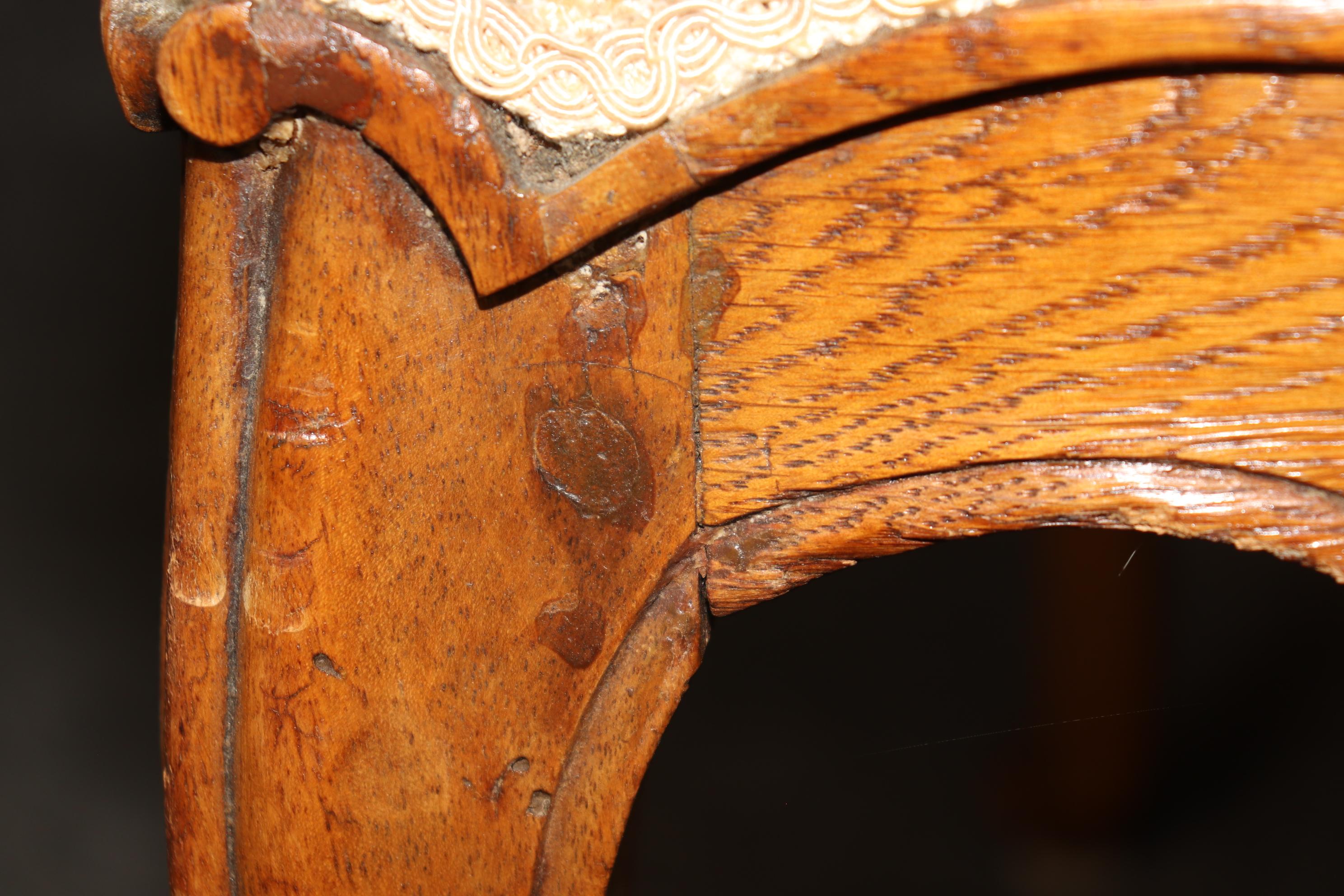 This is a period, mortice and tenoned French Louis XV solid oak side chairs with exposed pins showing their original construction. These are beautiful pieces of history in good antique condition. They date to the 1790s era. Measures 39.25 tall x