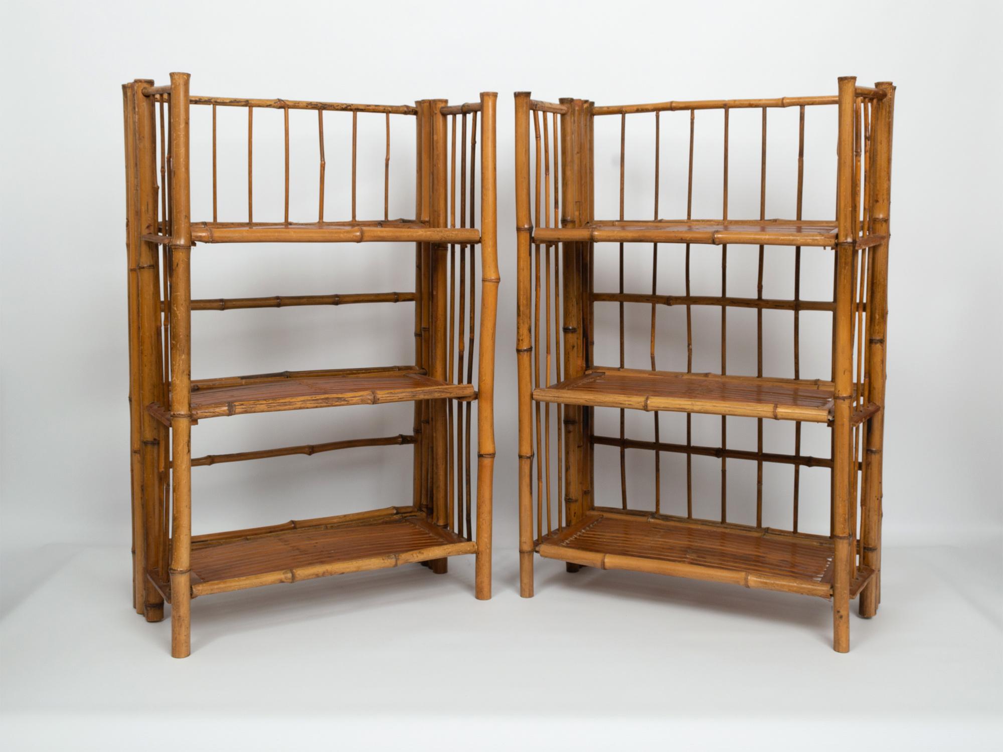 Pair of early 20th Century bamboo folding étagères campaign shelves. Three shelves can be folded into various configurations as needed or can be folded entirely flat for neat storage.

Very good condition
