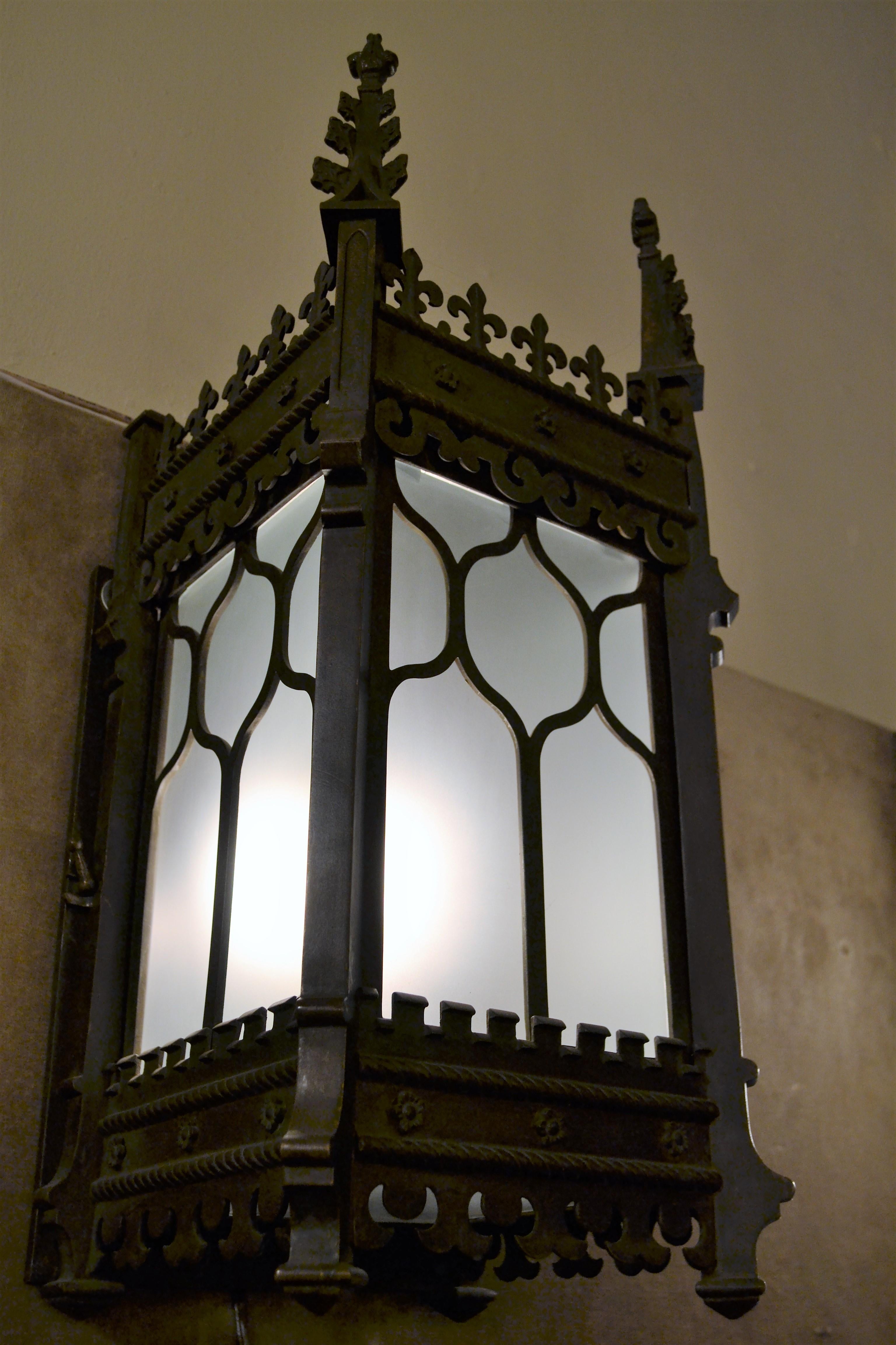 Pair of antique 19th century bronze lanterns in the Gothic style.