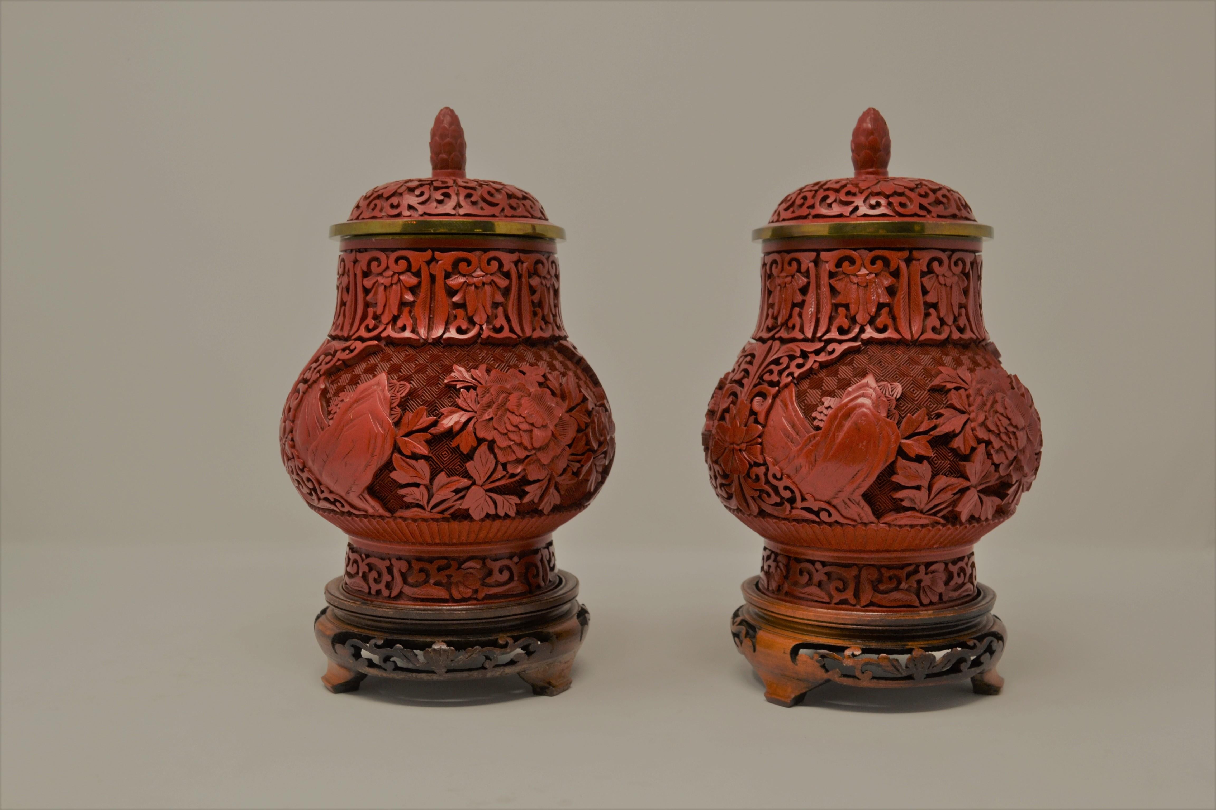 Pair of antique 19th century Chinese cinnabar urns.