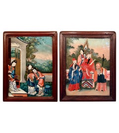 Pareja de cuadros antiguos chinos del siglo XIX, pintados con la técnica del eglomisé sobre cristal y enmarcados en madera de teca