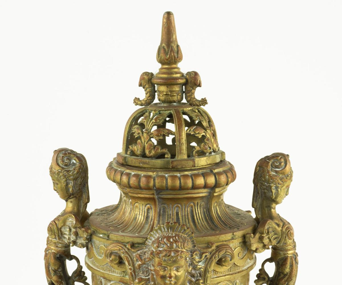 This is a pair of very unusual antique gilt bronze perfume aroma dispensers/Incense burners. As odors from both bodies and the environment were especially strong in the 19th century prior to modern bathing and plumbing, many ways wearer used to mask