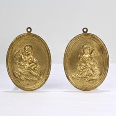 Pair of Antique 19th Century French Gilt Doré Bronze Plaques with Cupid