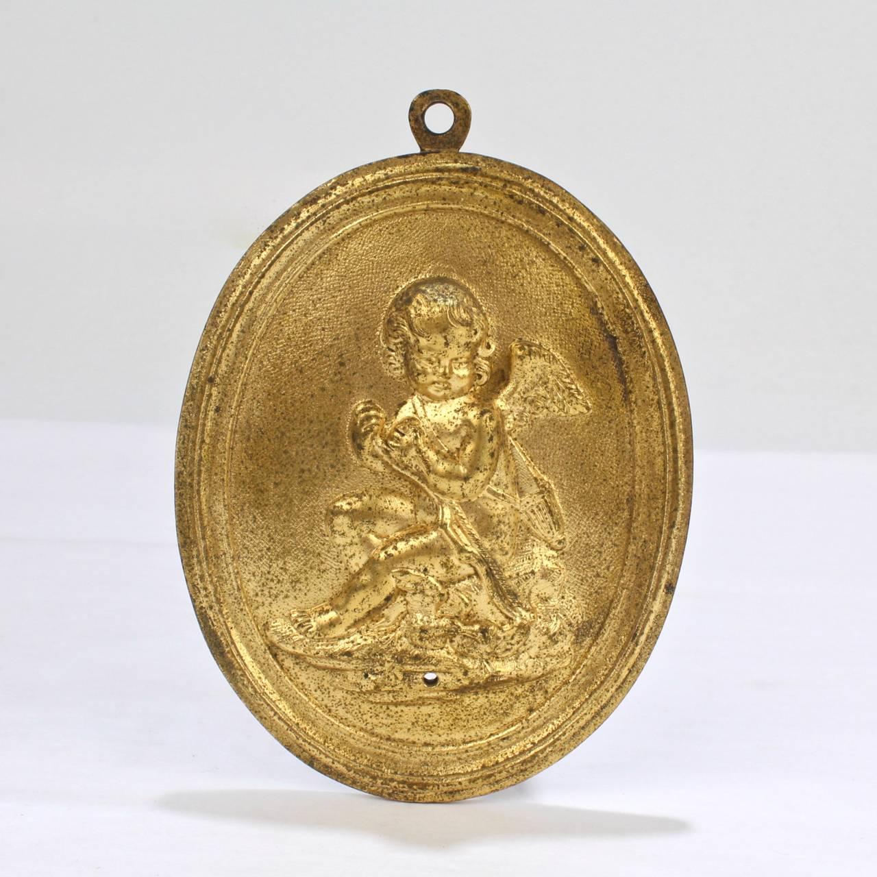 Pair of Antique 19th Century French Gilt Doré Bronze Plaques with Cupid In Good Condition In Philadelphia, PA