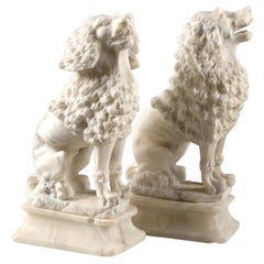 Pair of Antique Alabaster Spaniel Statues
