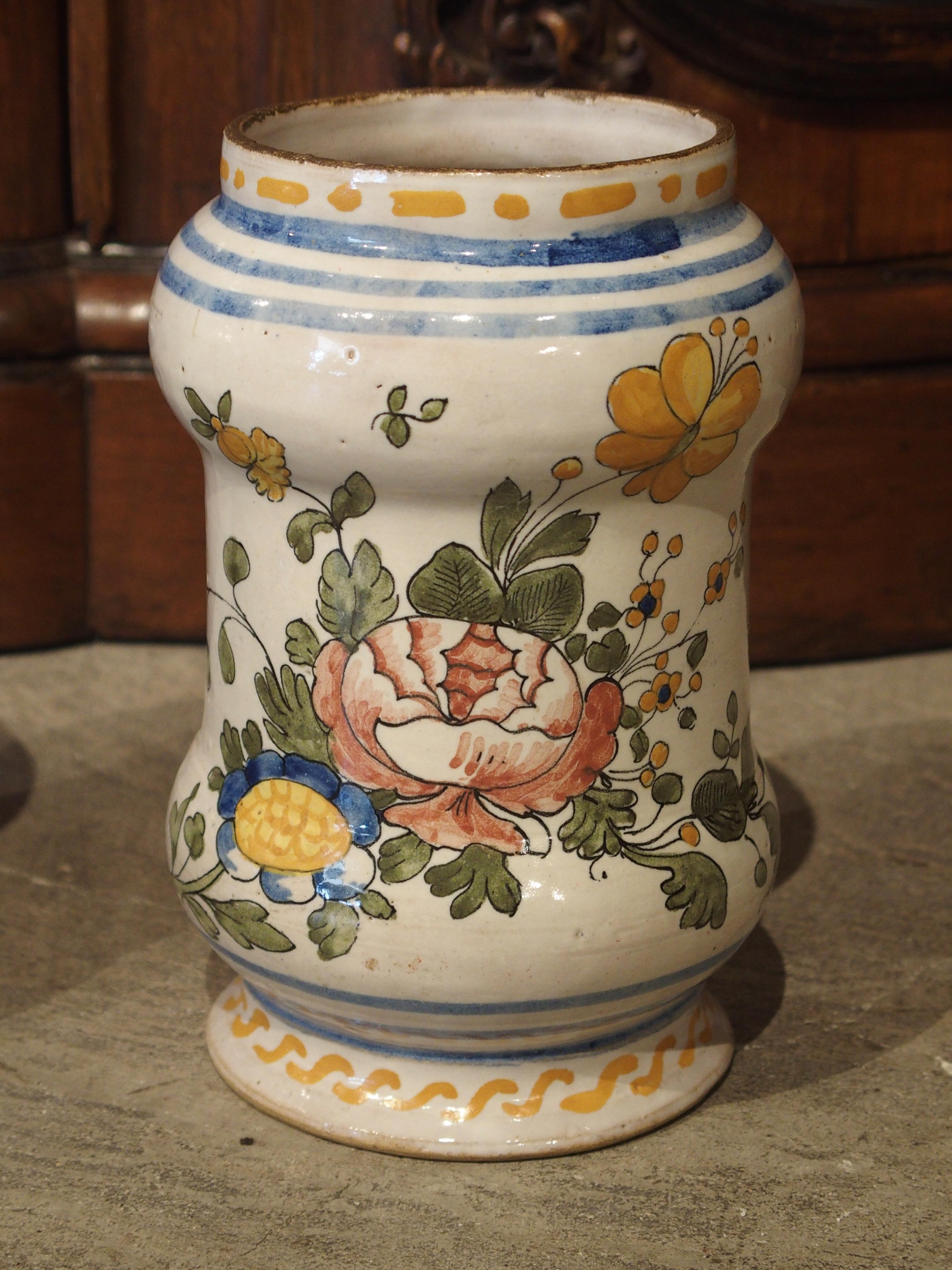 This pair of tin glazed earthenware or Italian Majolica pots were originally used for holding apothecaries’ ointments or dry drugs. Albarello is the Italian name of this type of majolica vessel. The pair shown below are late 19th century, and they