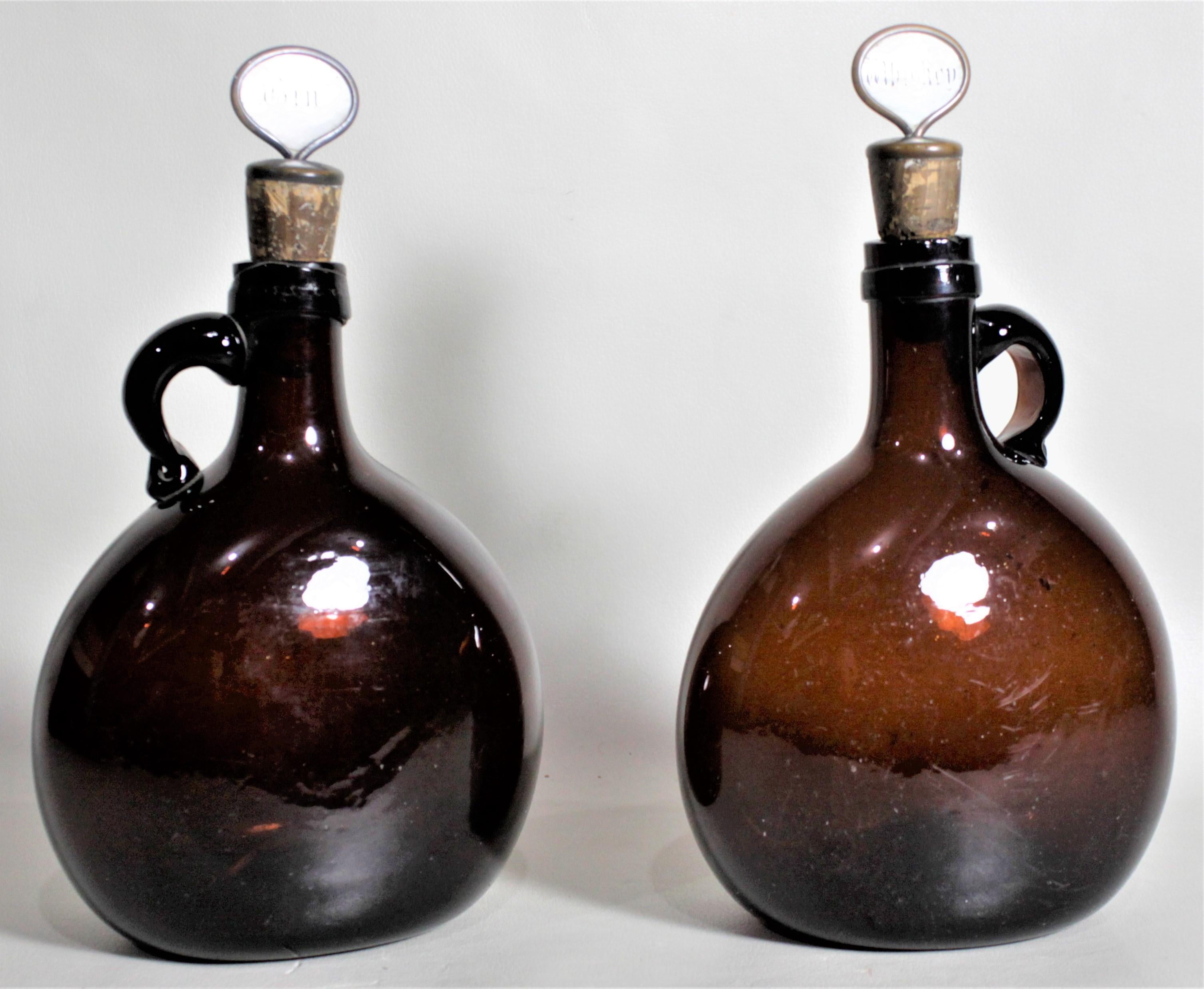 Mother-of-Pearl Pair of Antique Amber Glass Liquor Decanters with Mother of Pearl Stoppers For Sale