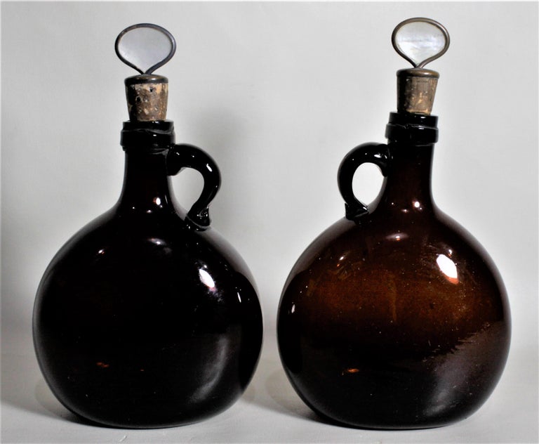 Pair of Antique Amber Glass Liquor Decanters with Mother of Pearl