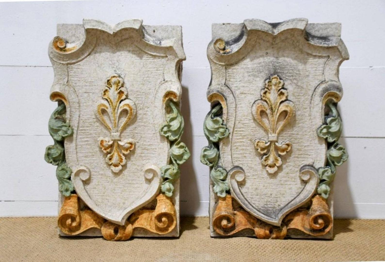 A fabulous pair of large polychrome painted terra cotta architectural salvaged ornamental panel fragments / decorative building elements from St. Louis, Missouri.

The artistic, sculptural design makes for a fascinating decorative object that's