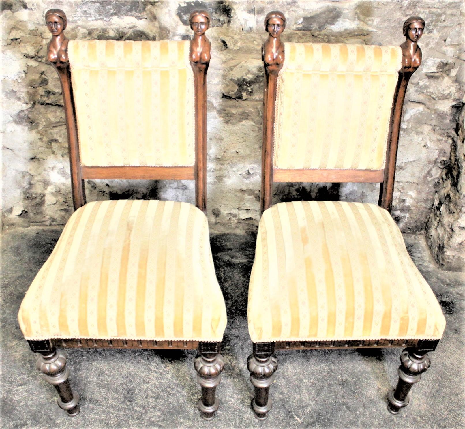 Hand-Carved Pair of Antique American Carved Walnut Parlor Chairs with Erotic Female Accents For Sale