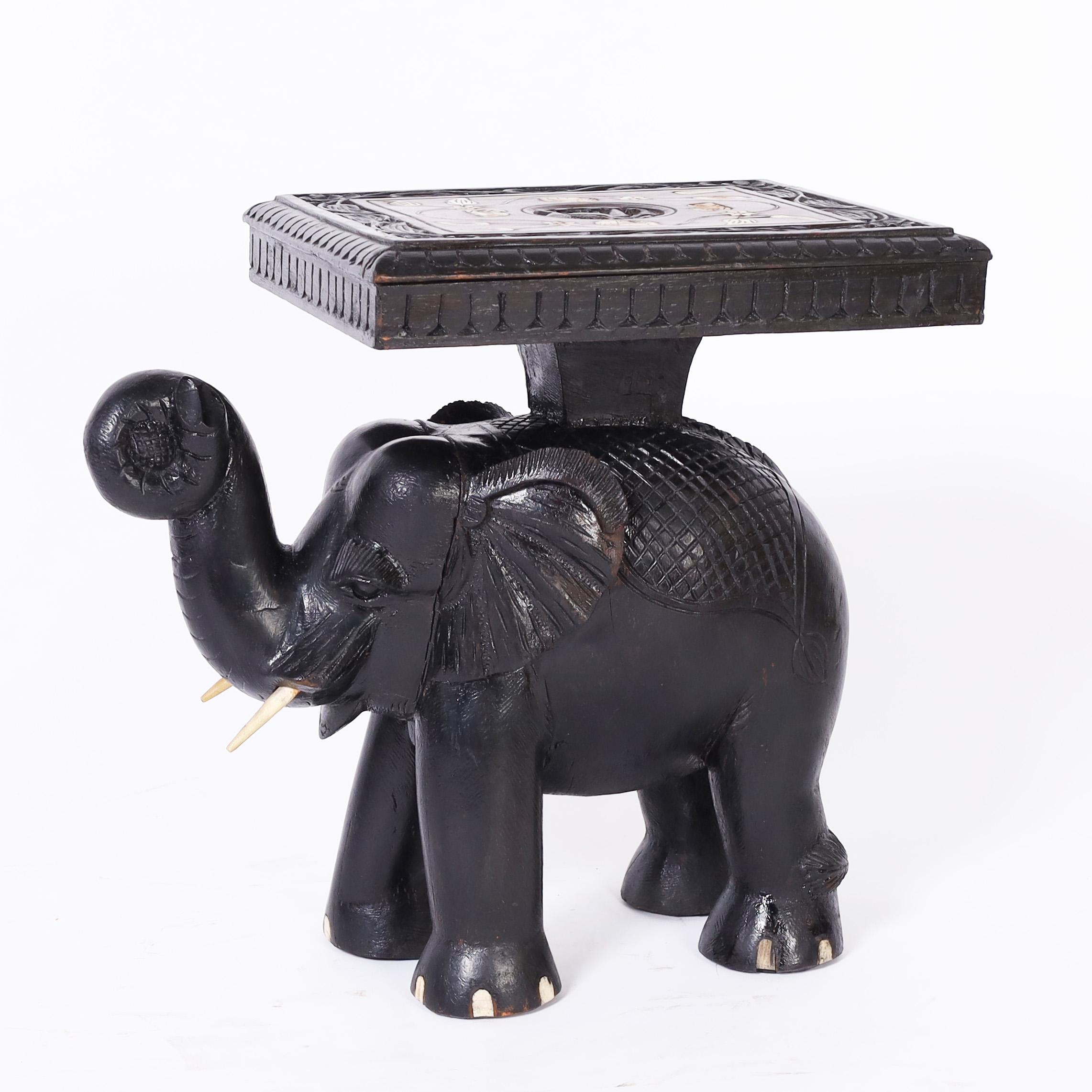 20th Century Pair of Antique Anglo Indian Teak Carved and Ebonized Elephant Stands or Tables For Sale