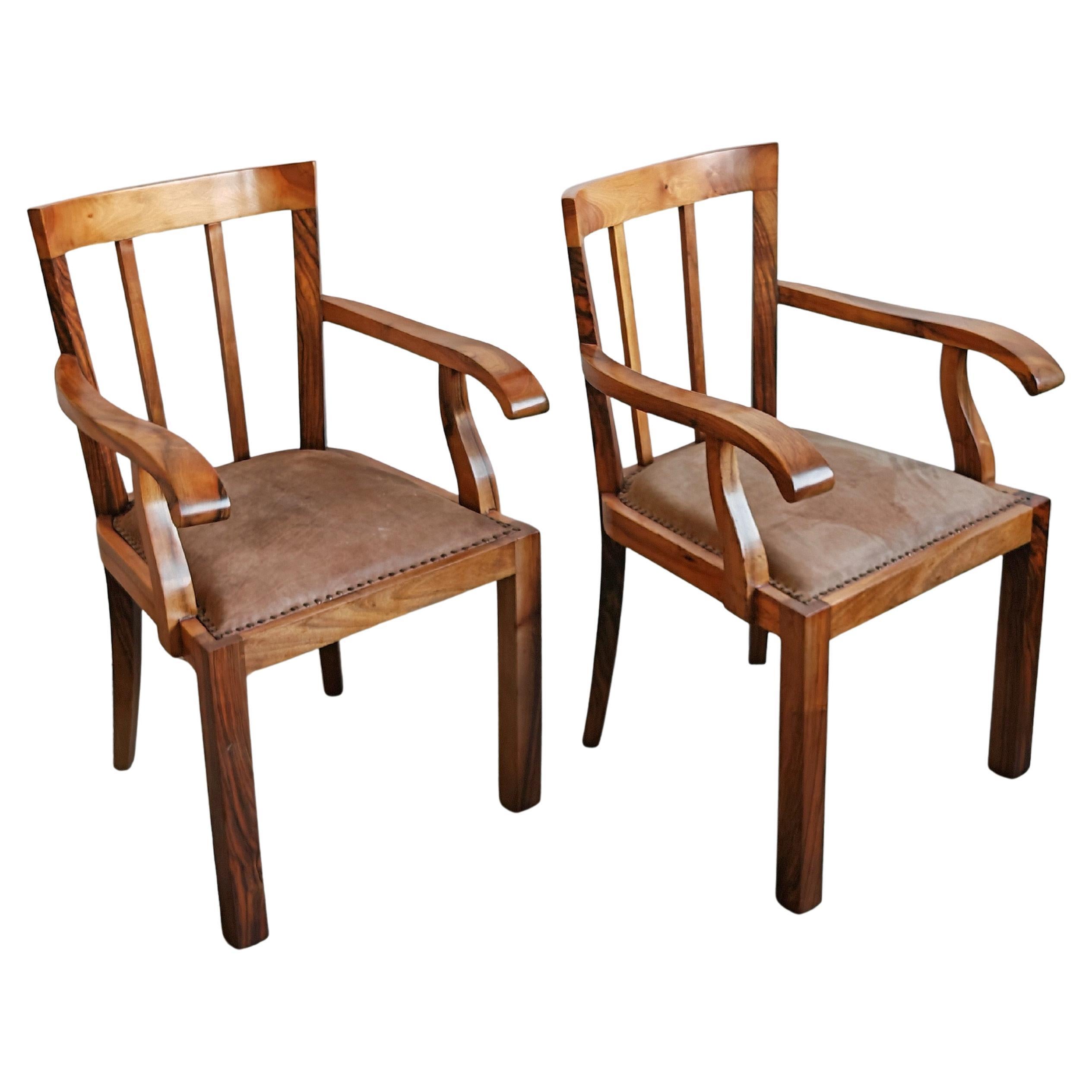 Pair of Antique Art Deco Armchairs in solid walnut and leather, France 1920s