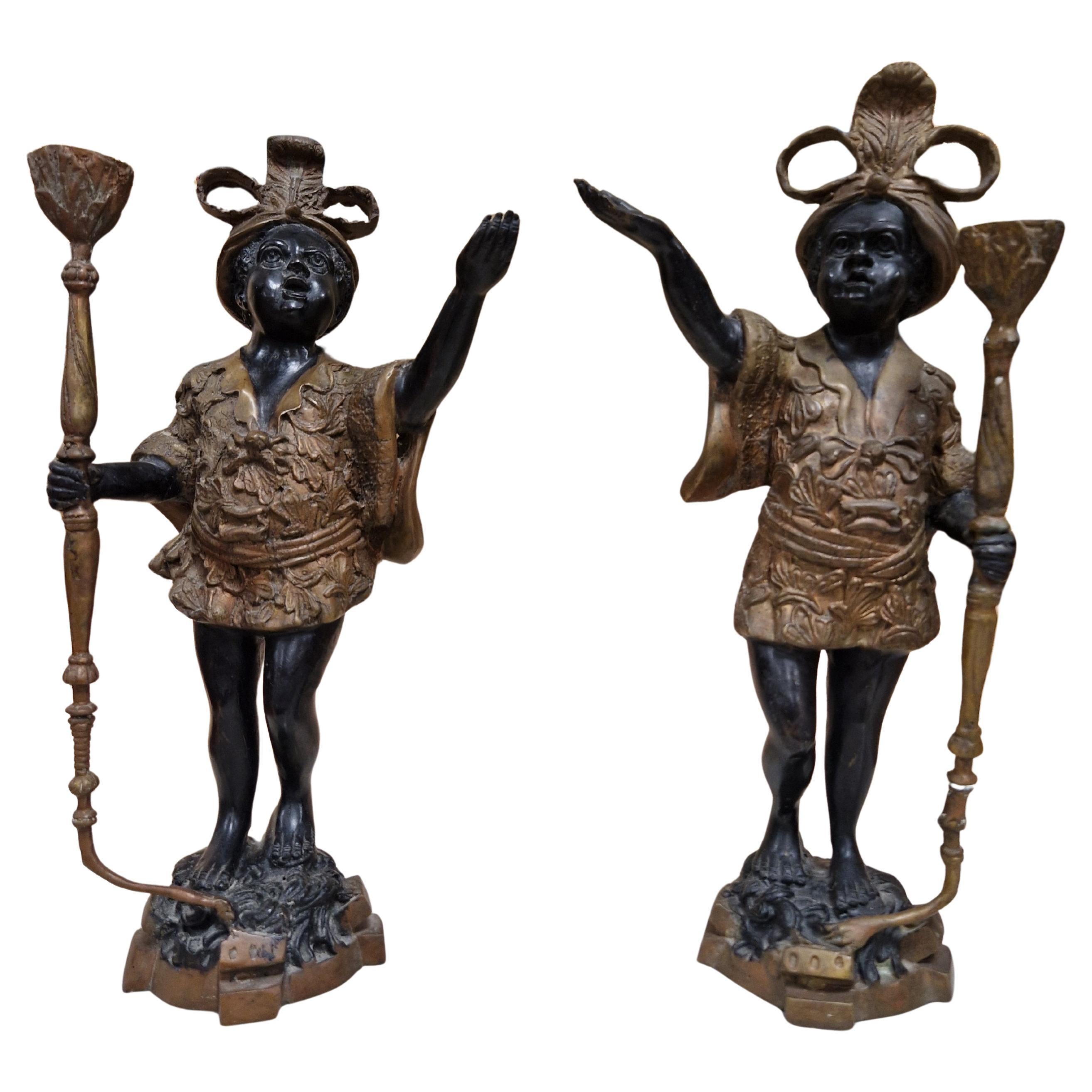 Pareja de candeleros antiguos Art Nouveau de bronce