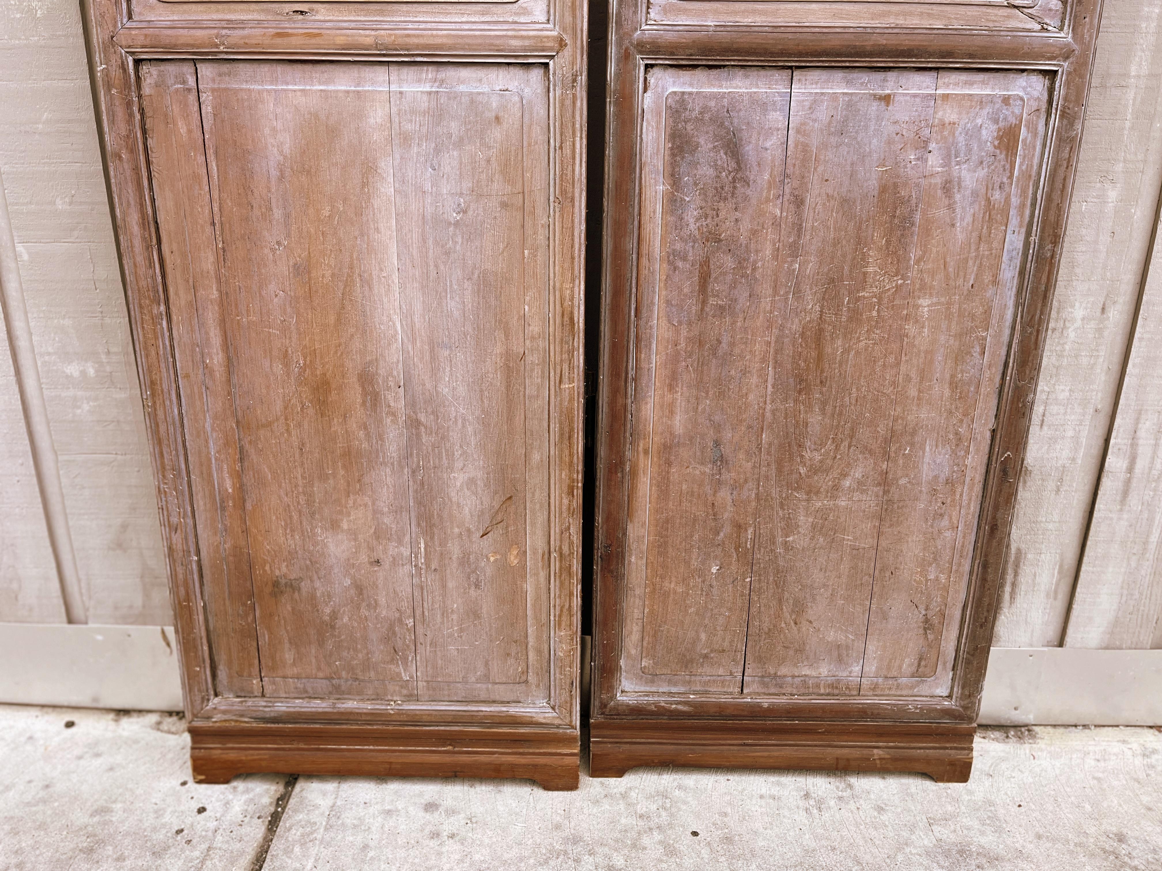 Pair of Antique Asian Door Panels with Relief Carvings In Good Condition For Sale In Greenwich, CT