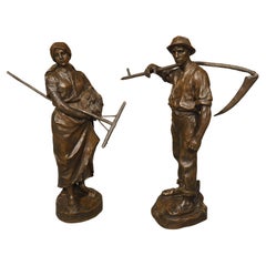 Paire d'anciennes figurines en bronze autrichiennes "revenant des champs", Hans Müller