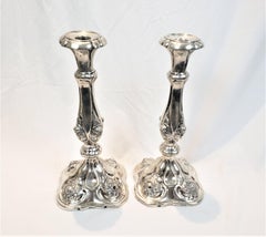 Pair of Antique Austro-Hungarian Silver Candlesticks with Chased Flowers