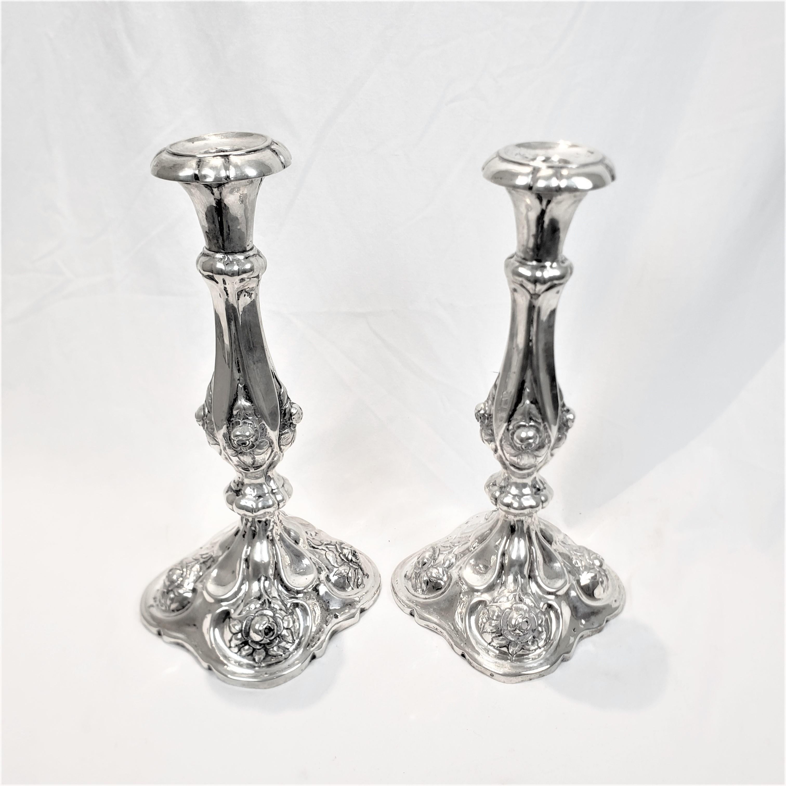 Pair of Antique Austro-Hungarian Silver Candlesticks with Chased Flowers In Good Condition For Sale In Hamilton, Ontario