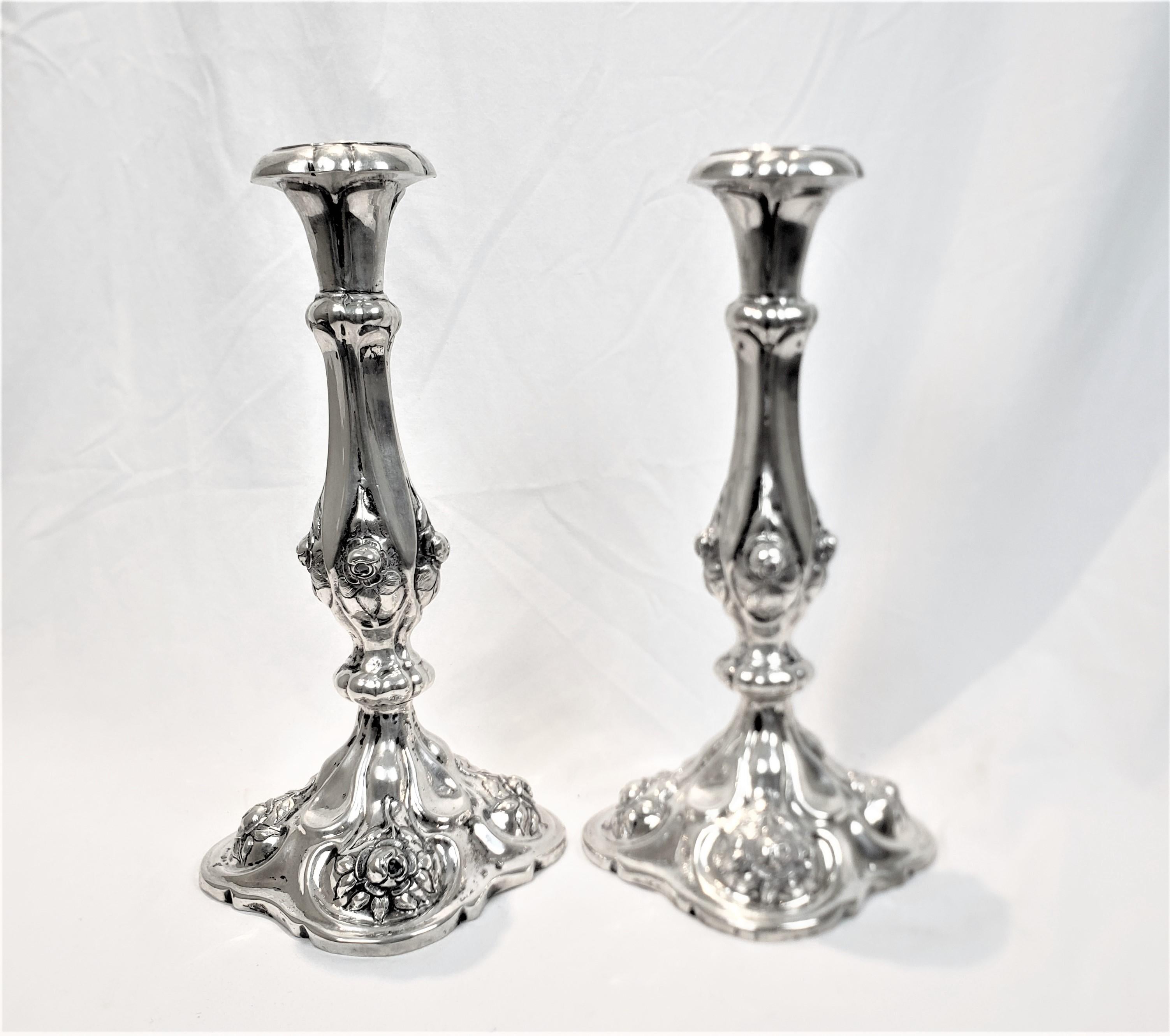 19th Century Pair of Antique Austro-Hungarian Silver Candlesticks with Chased Flowers For Sale