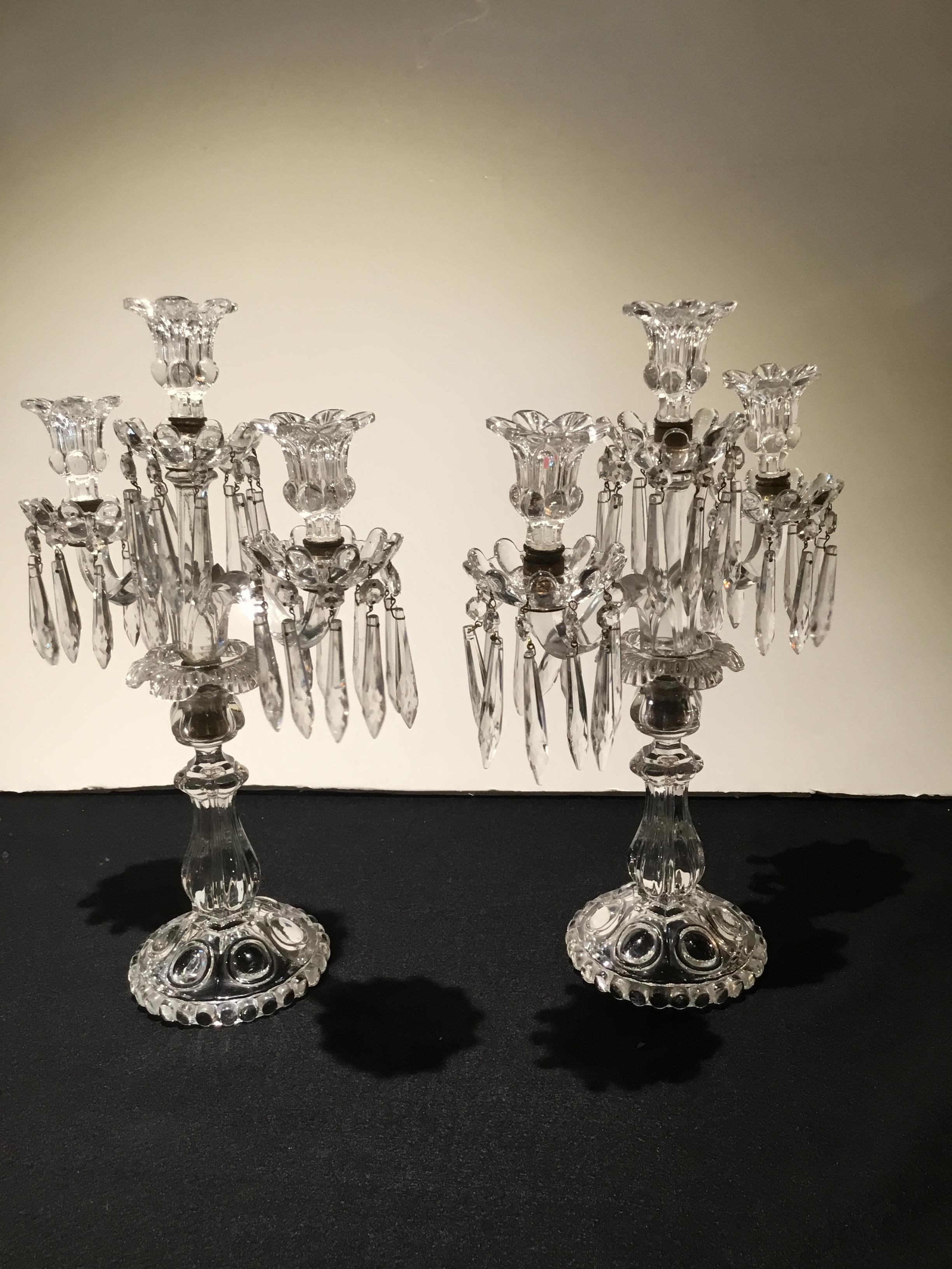 Elegant three-light crystal baccarat candelabrum. Beautifully shaped
Central support holding three candles each.