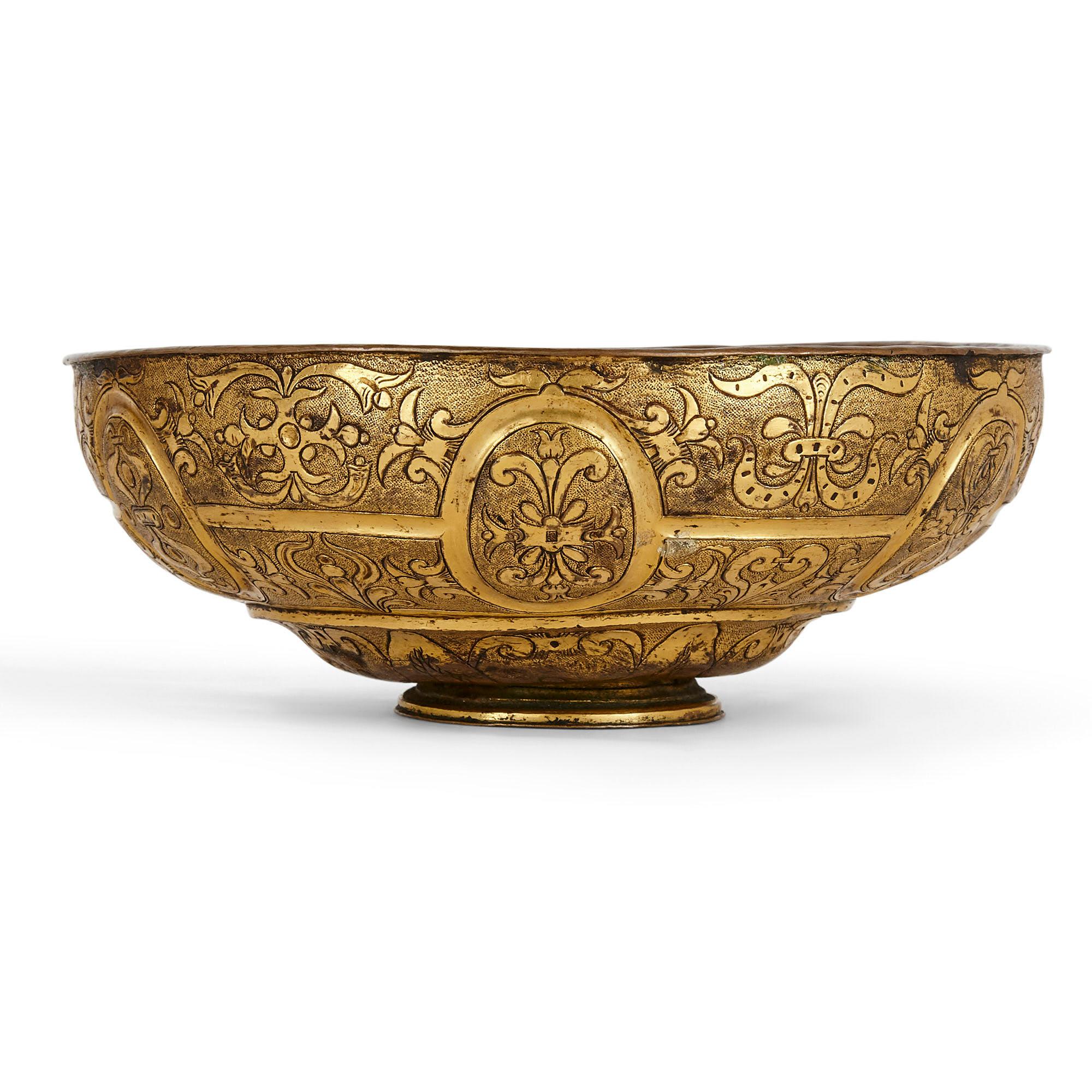 Pair of antique Baroque period Venetian gilt copper bowls
Italian, 17th century
Dimensions: height 7cm, diameter 19cm

This rare pair of 17th century Venetian bowls were exquisitely crafted from gilt copper and feature Fine engraved surface