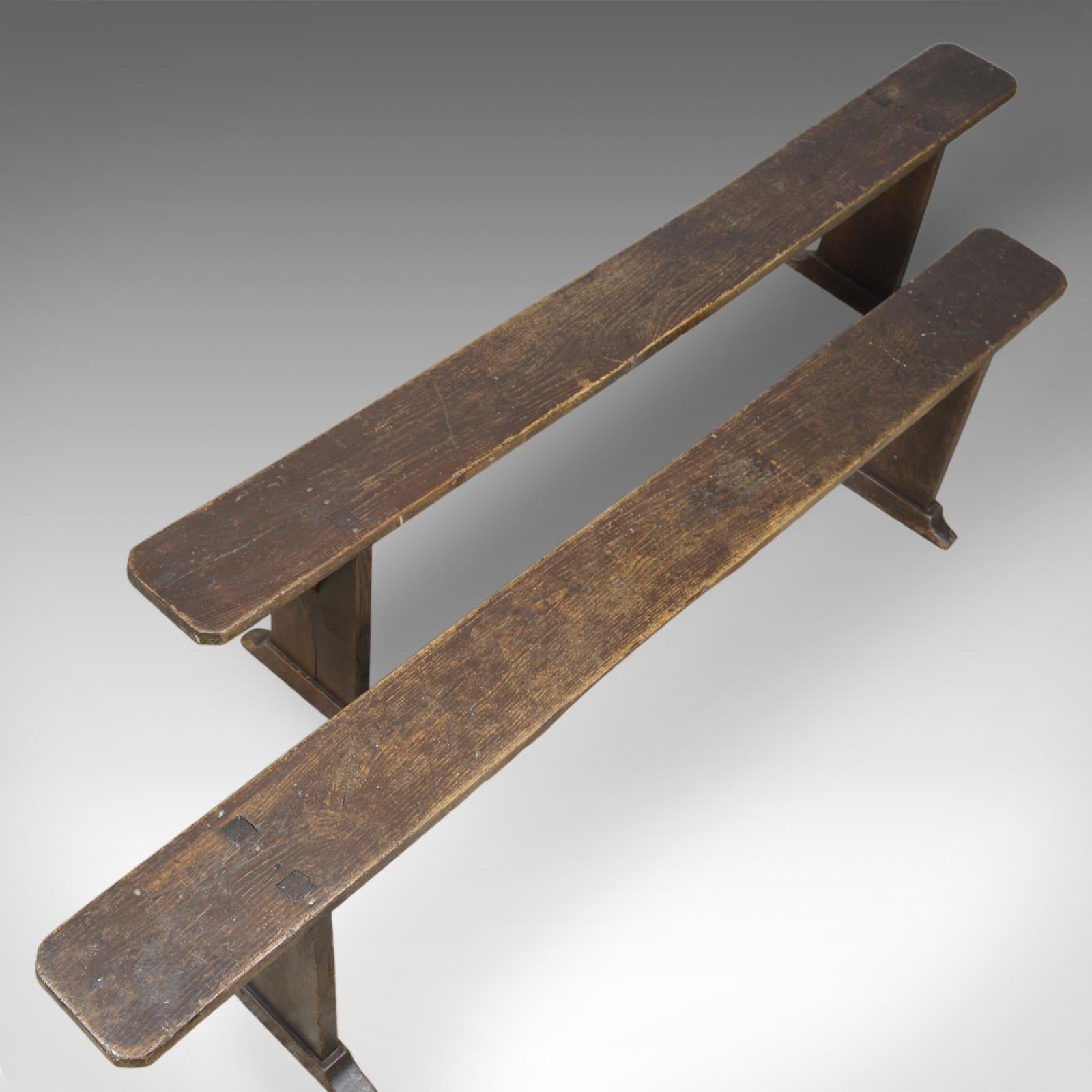 This is a pair of antique benches. Victorian, English, Provincial forms in oak, ideal for country kitchen dining and dating to the turn of the 20th century, circa 1900.

Full of country charm and character
Solid oak displaying grain interest