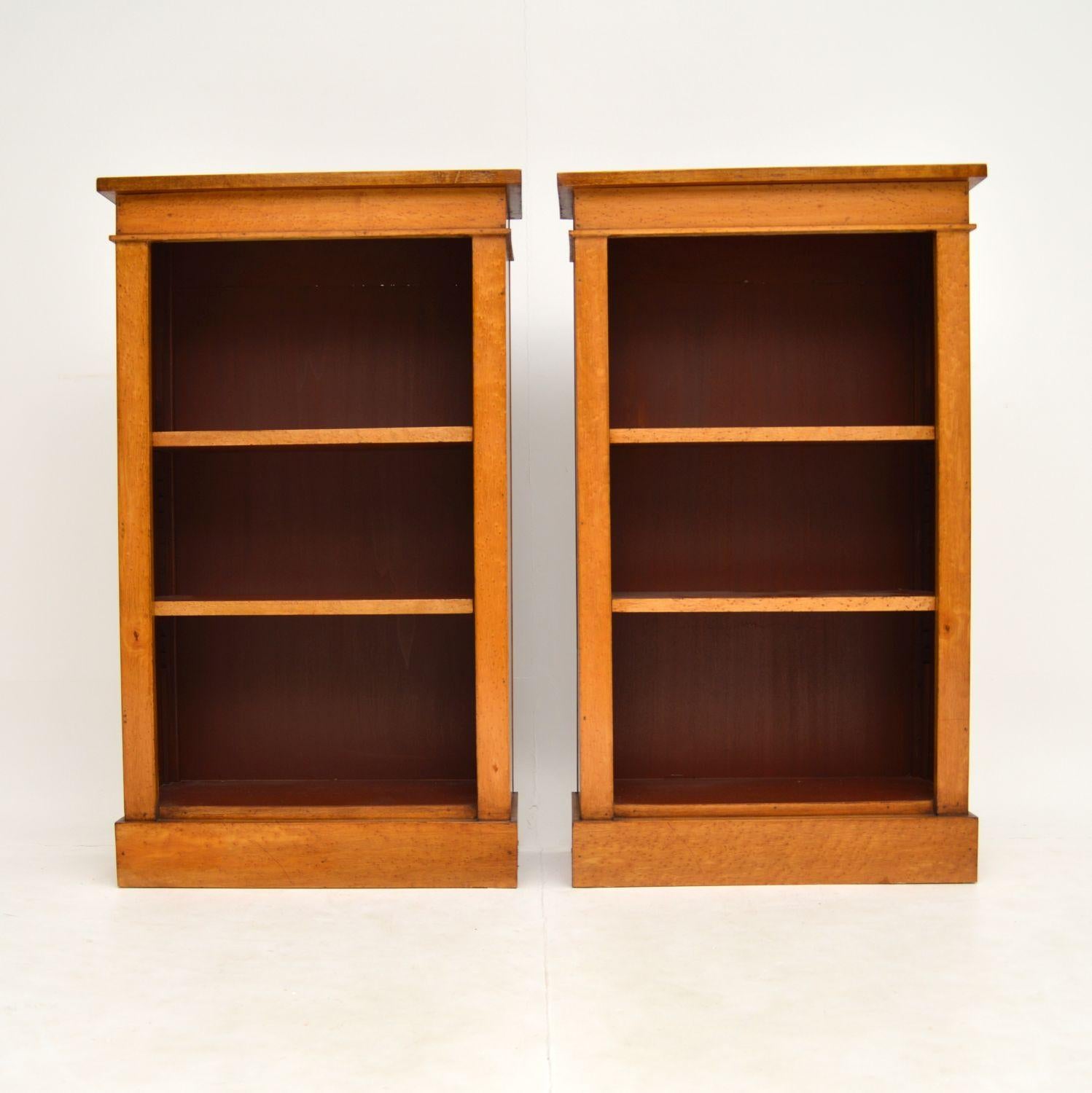 A smart and useful pair of reconstructed antique open bookcases, in the Victorian style. These were made from re-claimed wood from antique furniture.

Our cabinet makers veneered them in beautiful birds eye maple, and they have been finished