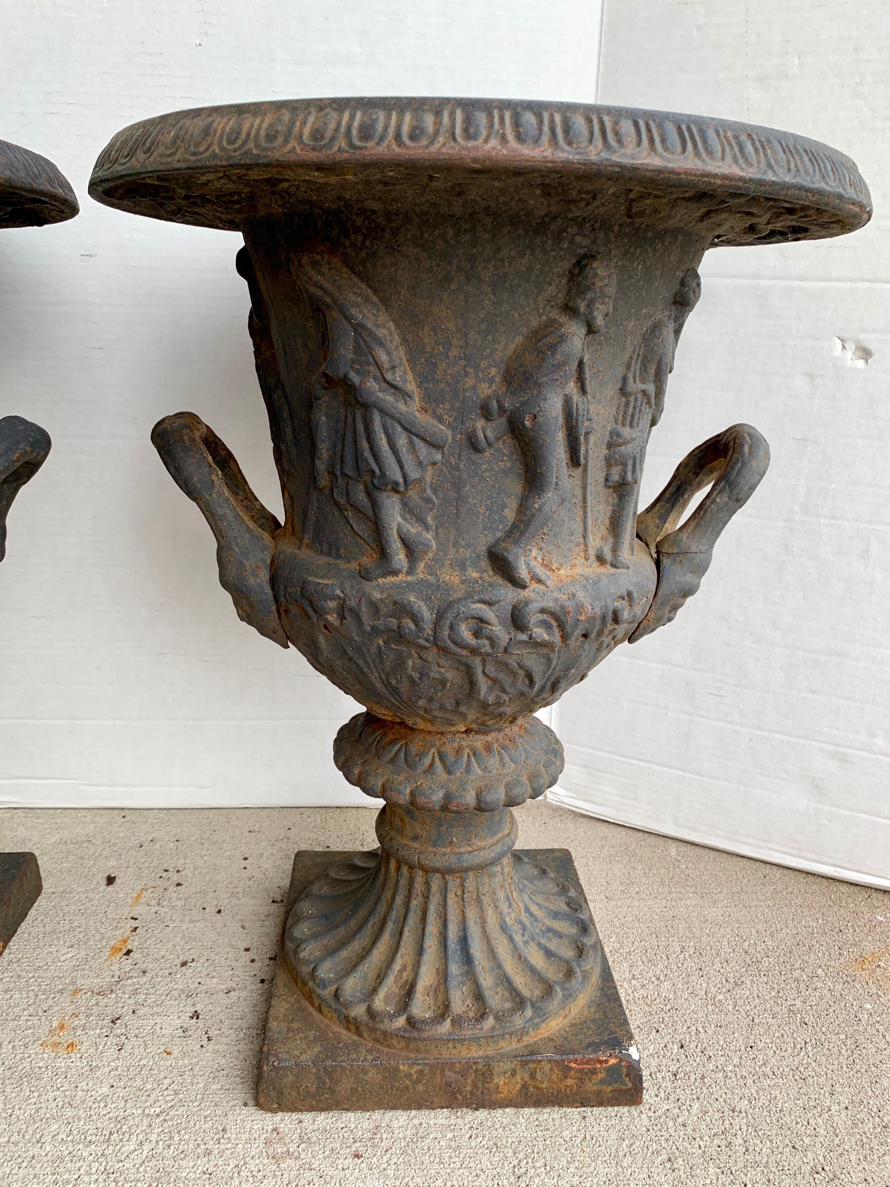 antique cast iron urns