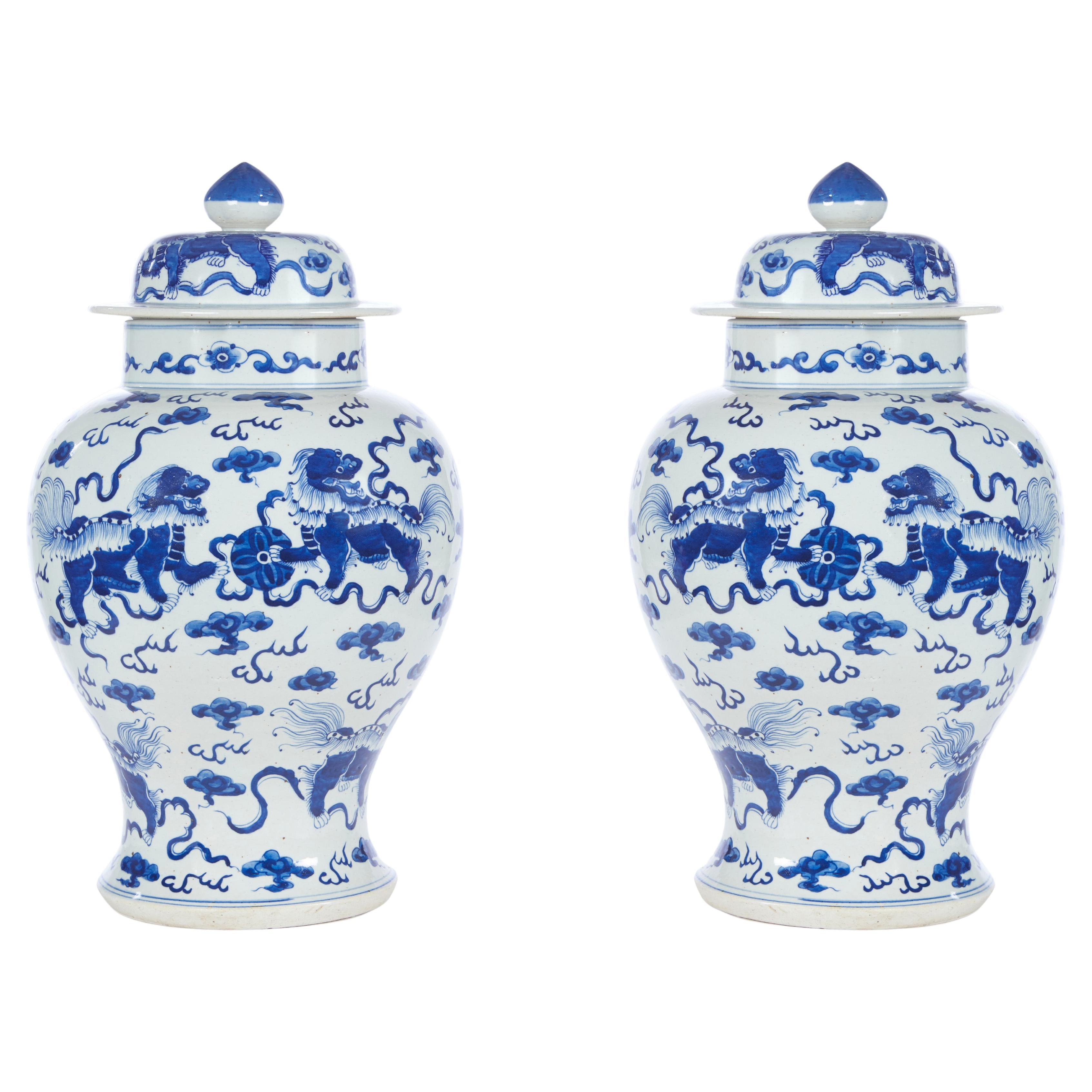 Pair of Antique Blue and White Vases with Covers For Sale